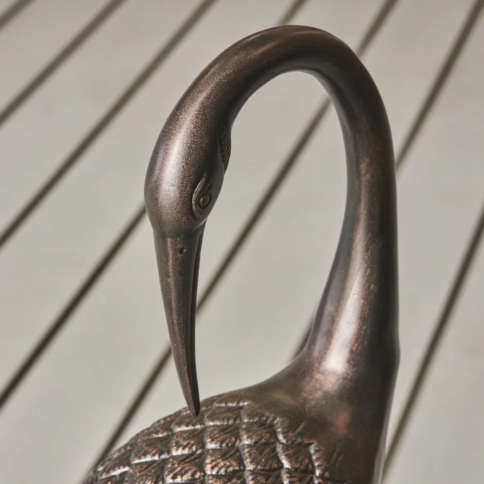 Bronze crane sculpture with textured body elegant design for garden decor