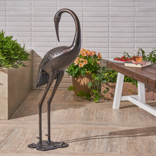 Bronze heron garden statue with detailed feather texture elegant and weathered finish