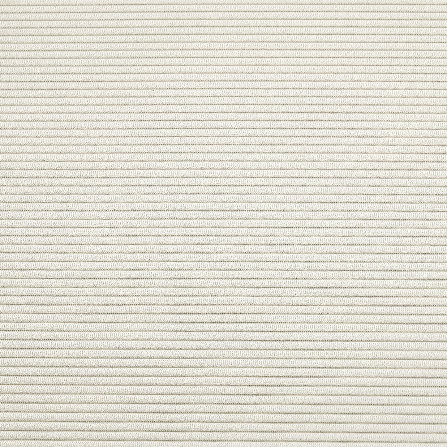 Closeup texture of creamcolored corduroy fabric with narrow ridges