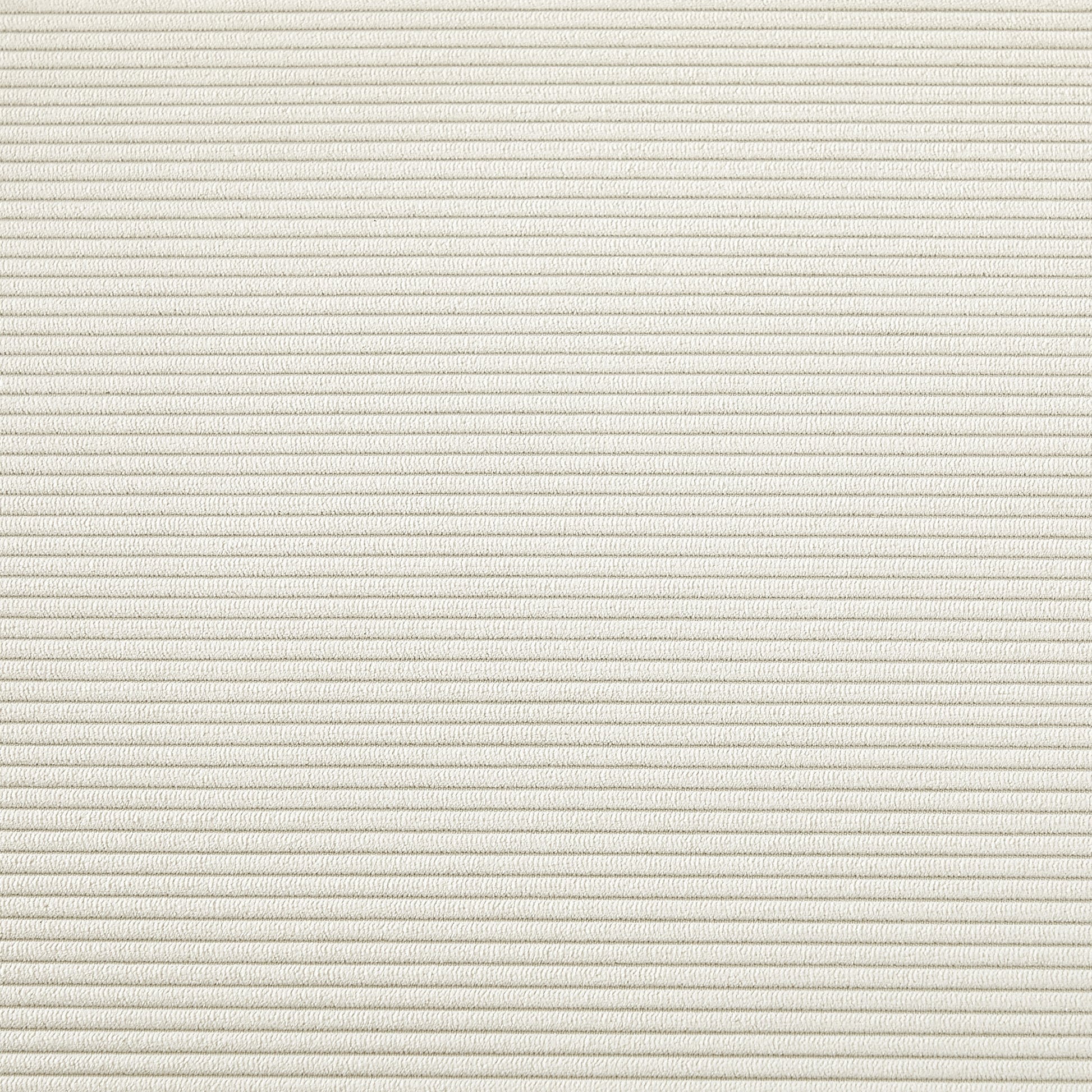 Closeup texture of creamcolored corduroy fabric with narrow ridges