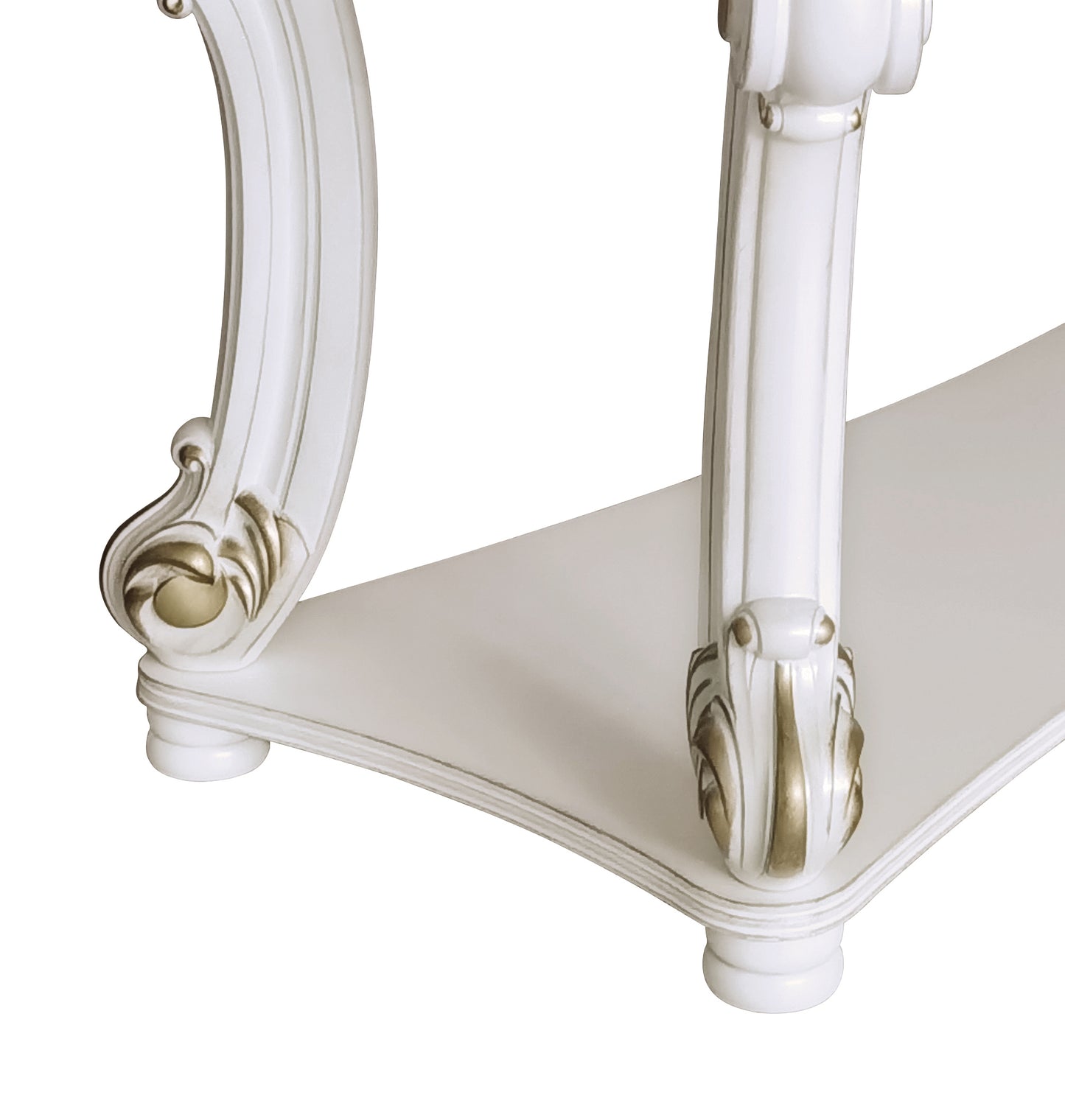 White ornate console table with gold accents on legs and edge