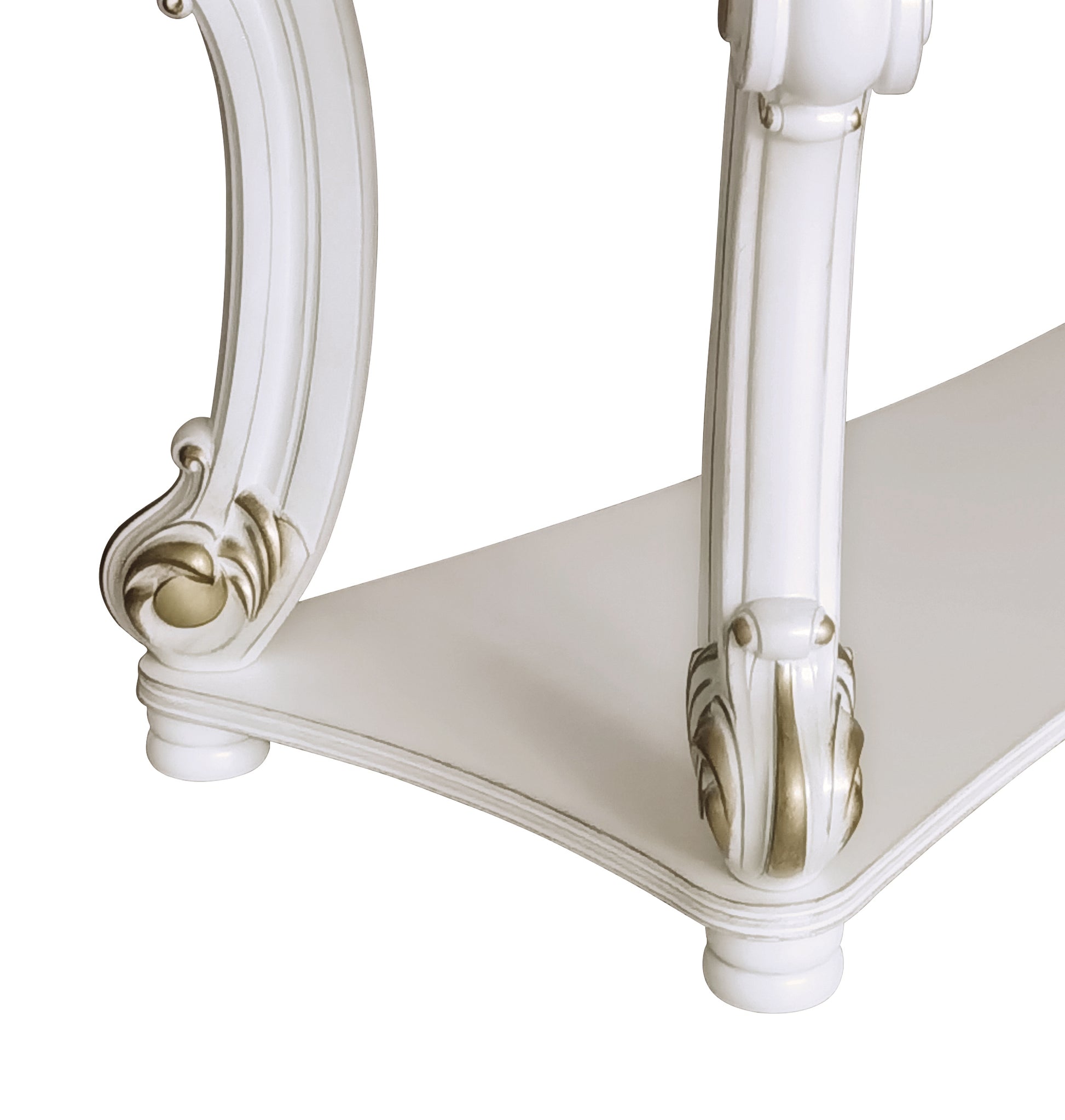White ornate console table with gold accents on legs and edge