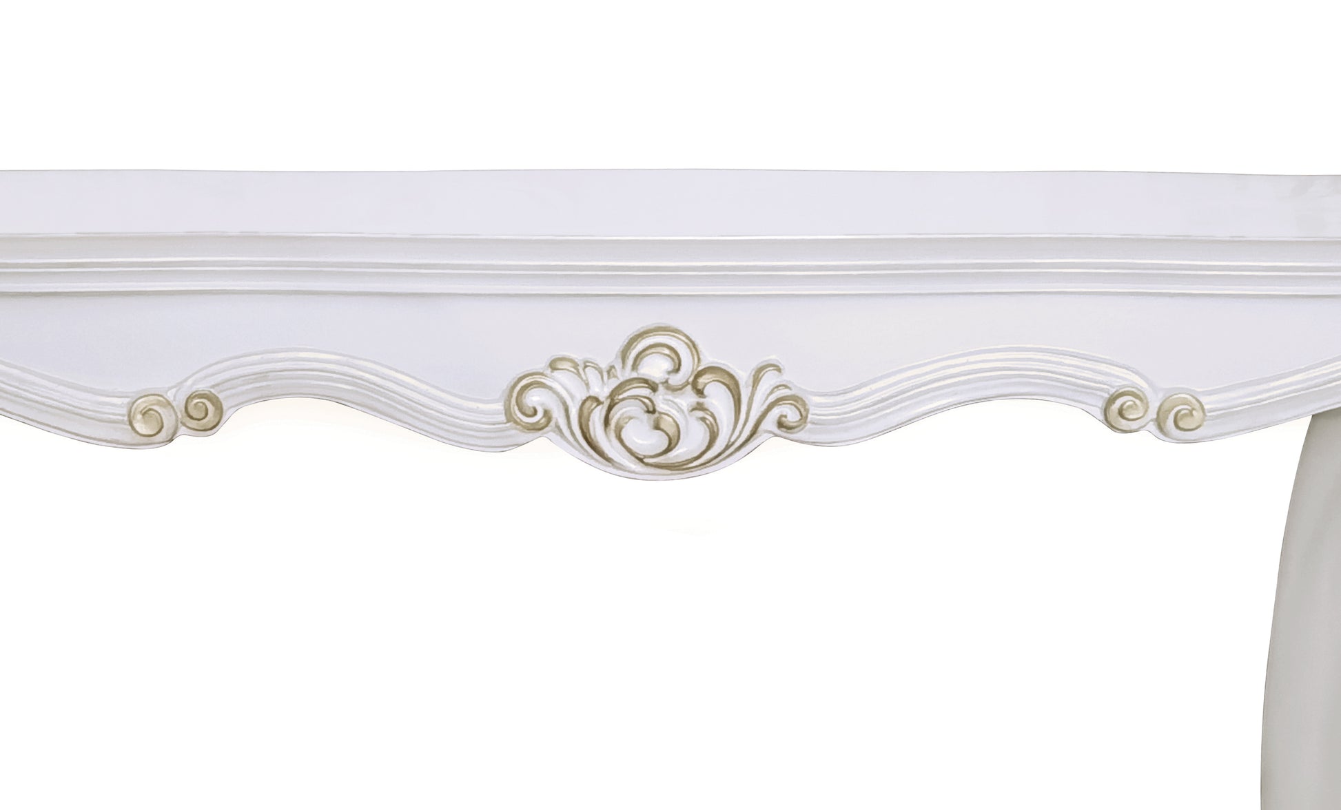 White ornate wooden decorative trim with gold scrollwork detail