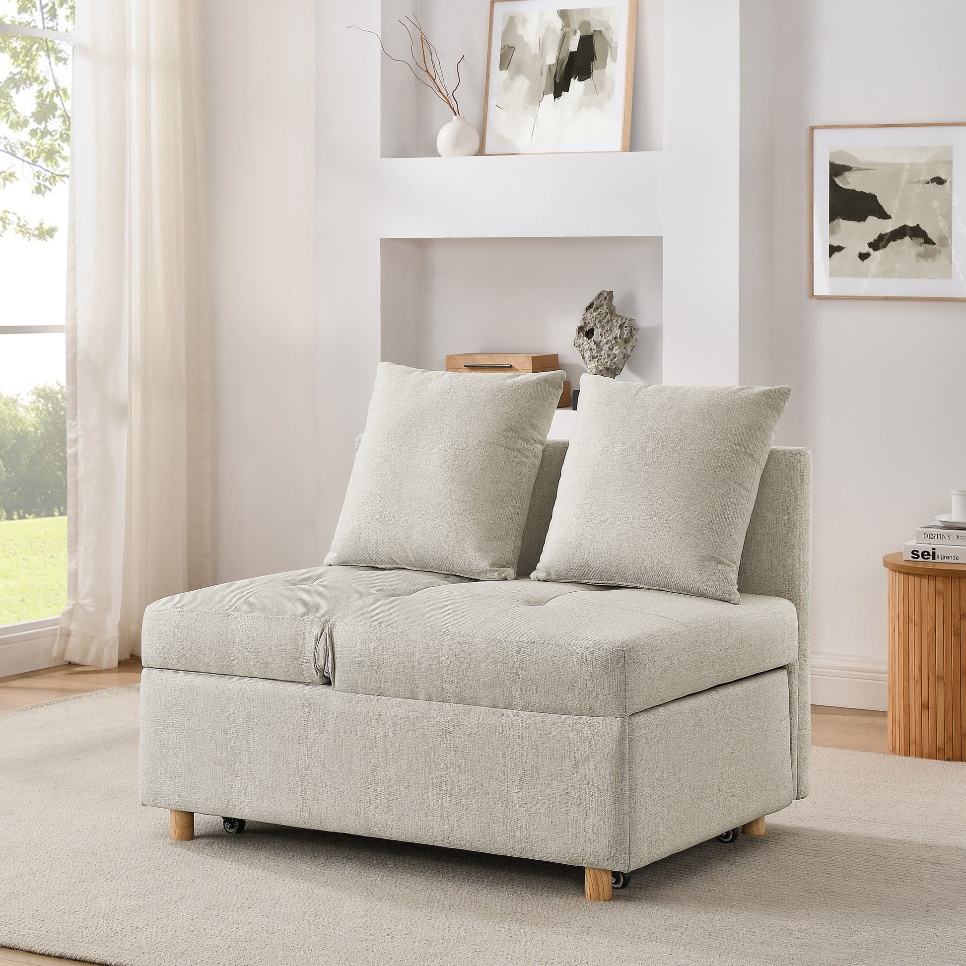 Cream upholstered sofa bed with two cushions and storage modern style