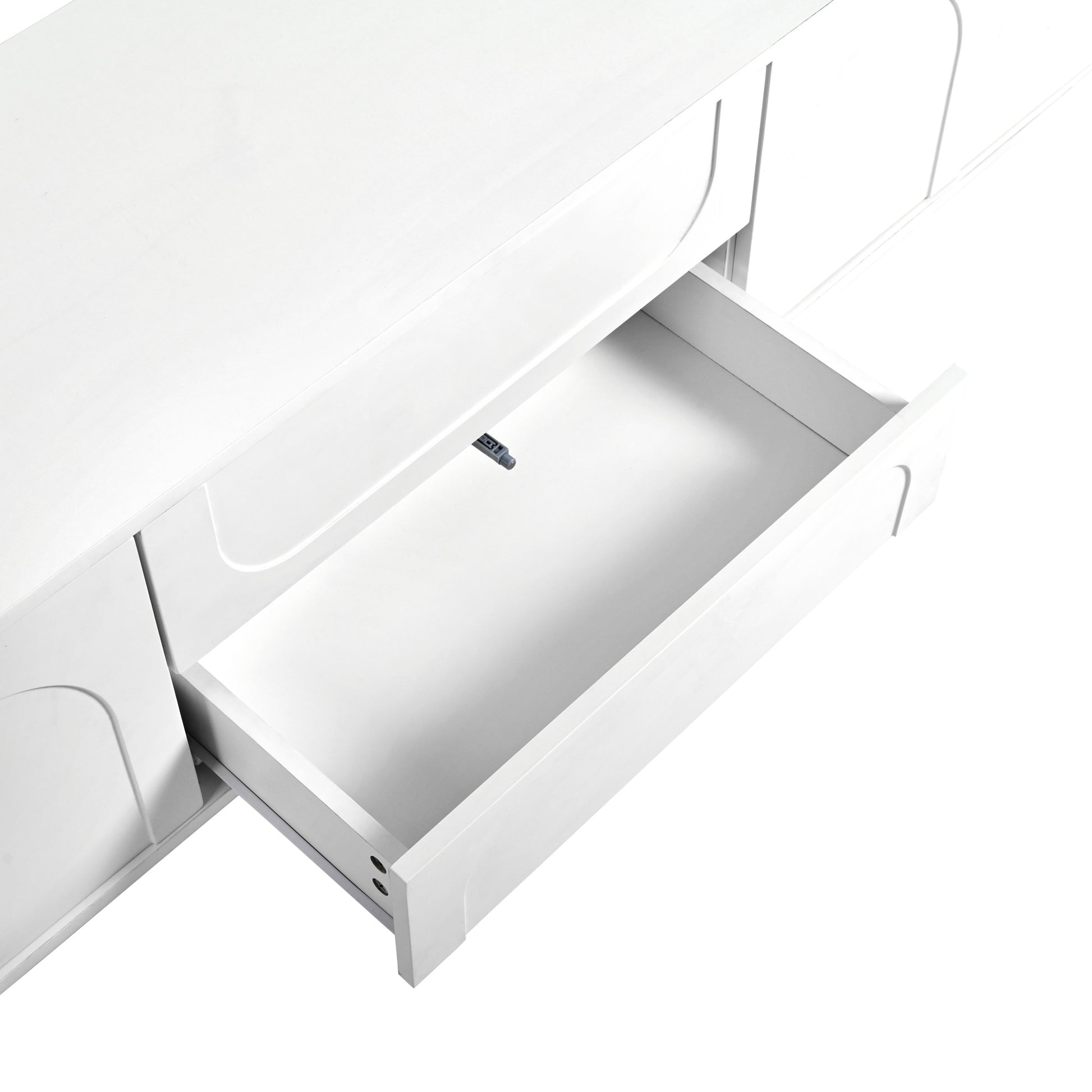 White modern dresser with one open drawer showing smooth gliding hardware