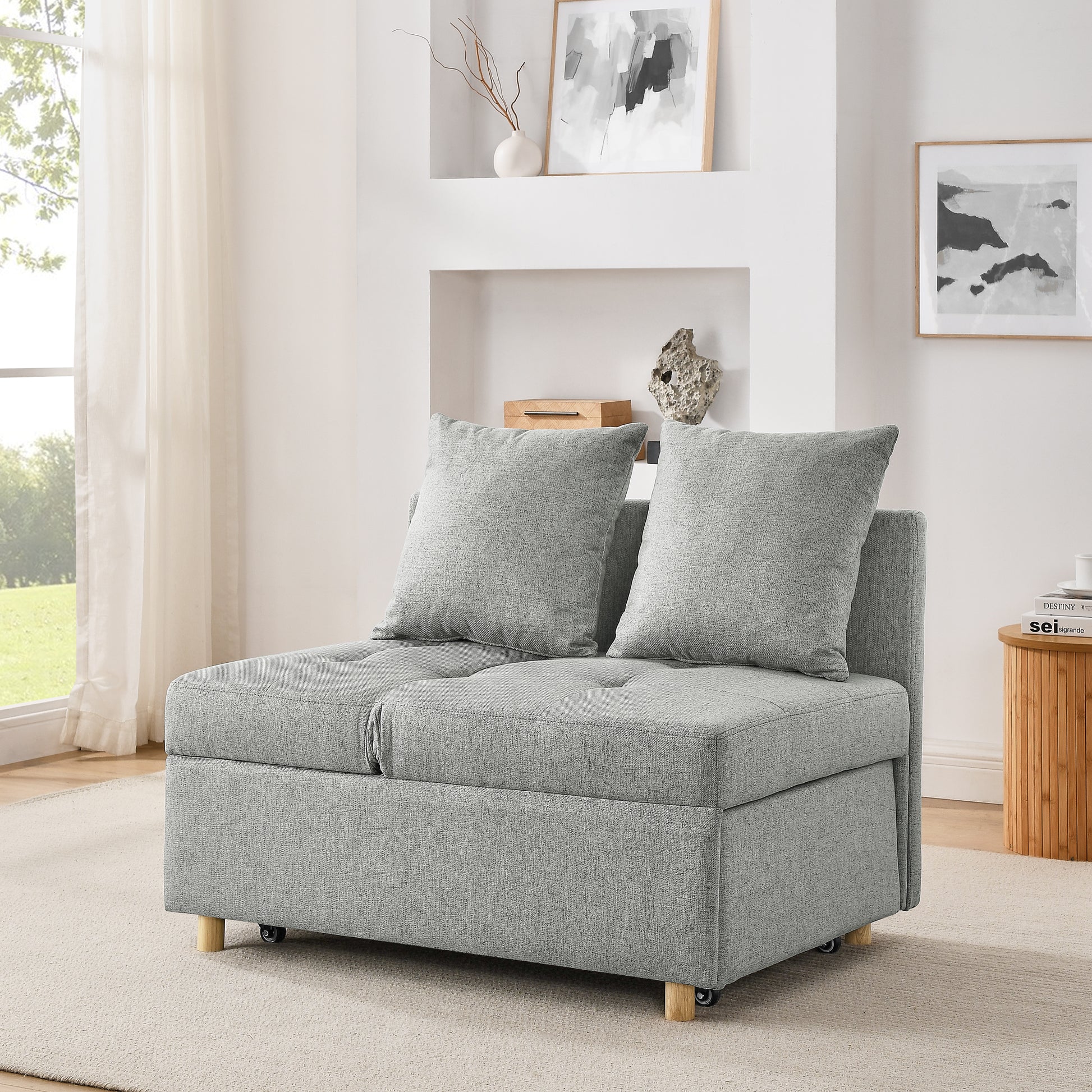 Gray fabric convertible sofa with hidden storage and wooden legs