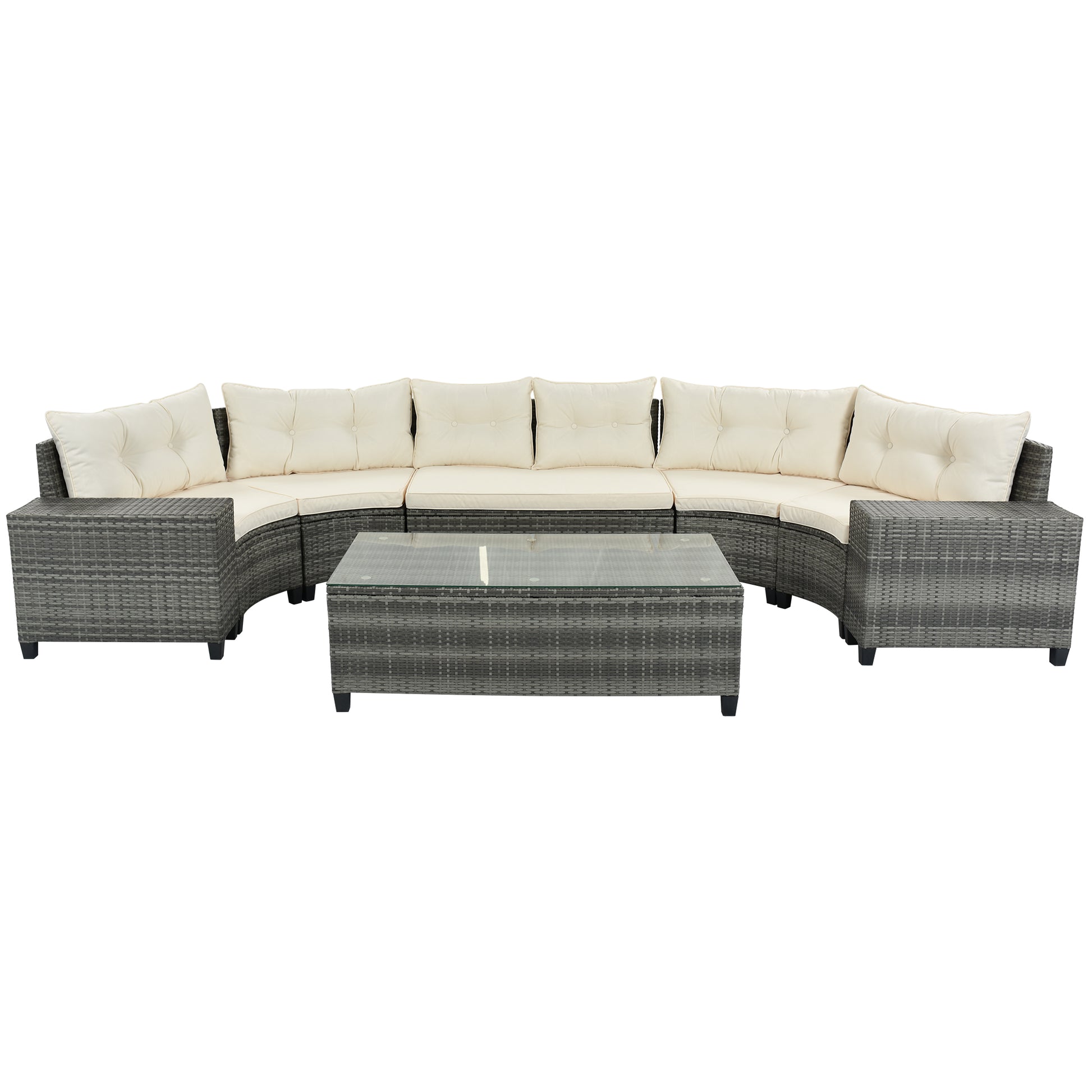 Curved grey wicker sectional sofa with cream cushions and glass top coffee table