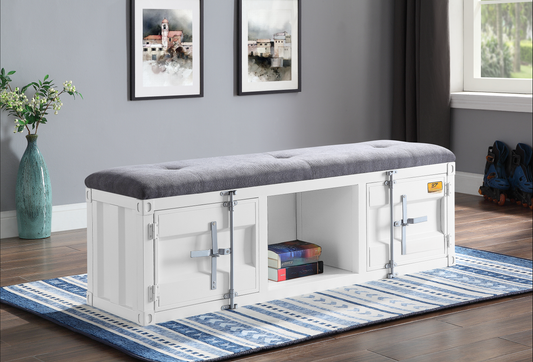 White industrial storage bench with tufted grey fabric seat and metal hardware