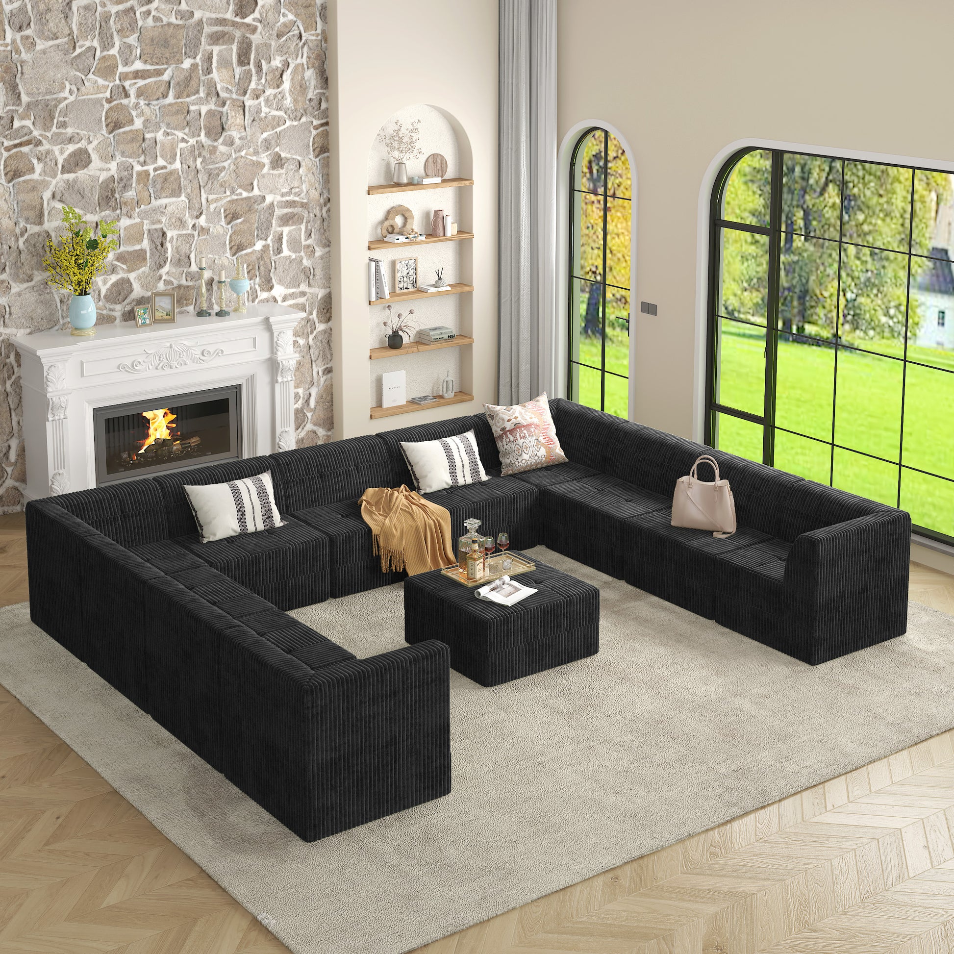 Spacious black corduroy Ushaped sectional sofa with plush cushions perfect for modern living rooms