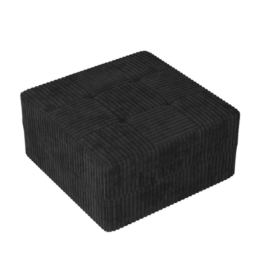 Black corduroy square ottoman with tufted top and ribbed sides