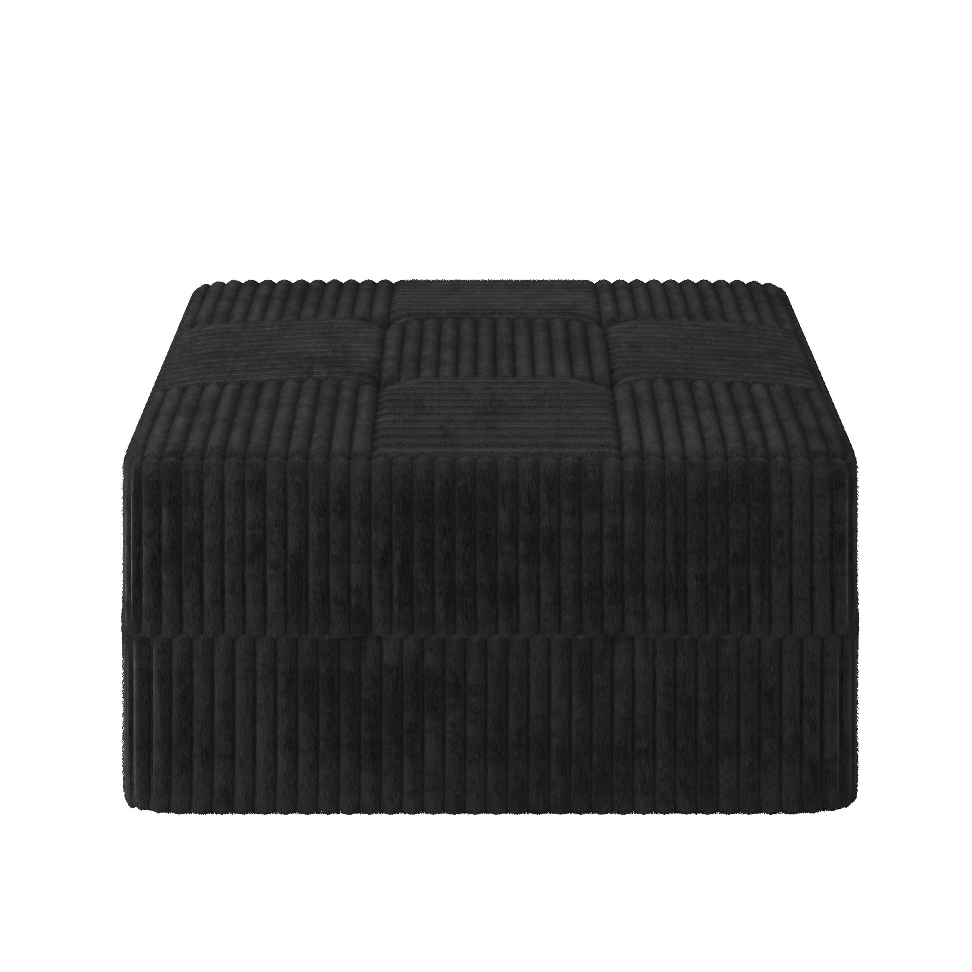 Black corduroy ottoman with tufted top perfect for footrest or extra seating
