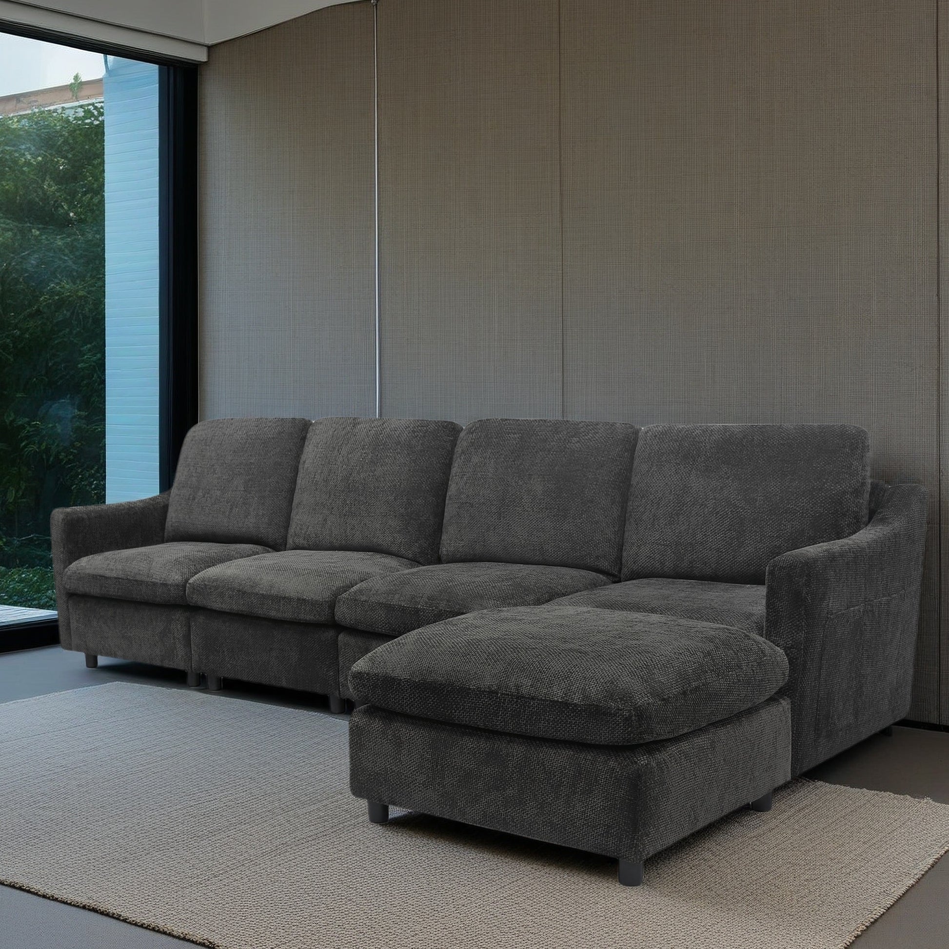 Deep charcoal sectional sofa with chaise lounge and textured fabric upholstery
