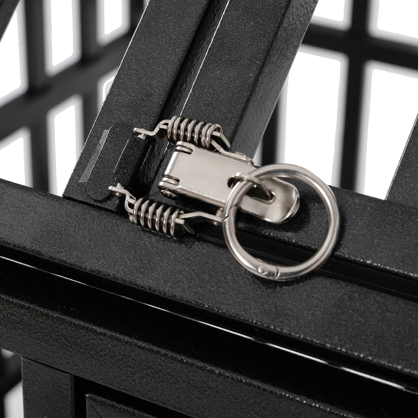 Black metal dog crate latch with springloaded mechanism and ring for easy opening