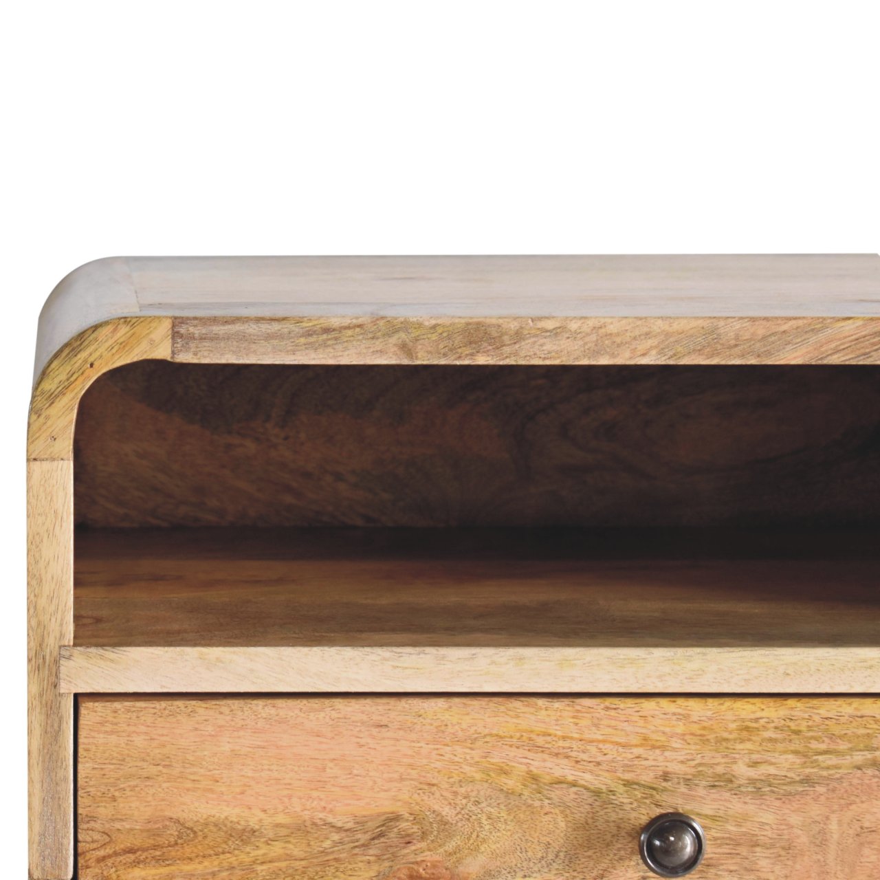 Closeup of a natural wood bedside table with rounded edges and a storage shelf