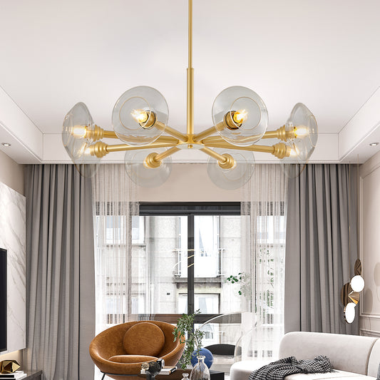Modern gold chandelier with clear glass shades illuminating a stylish living room