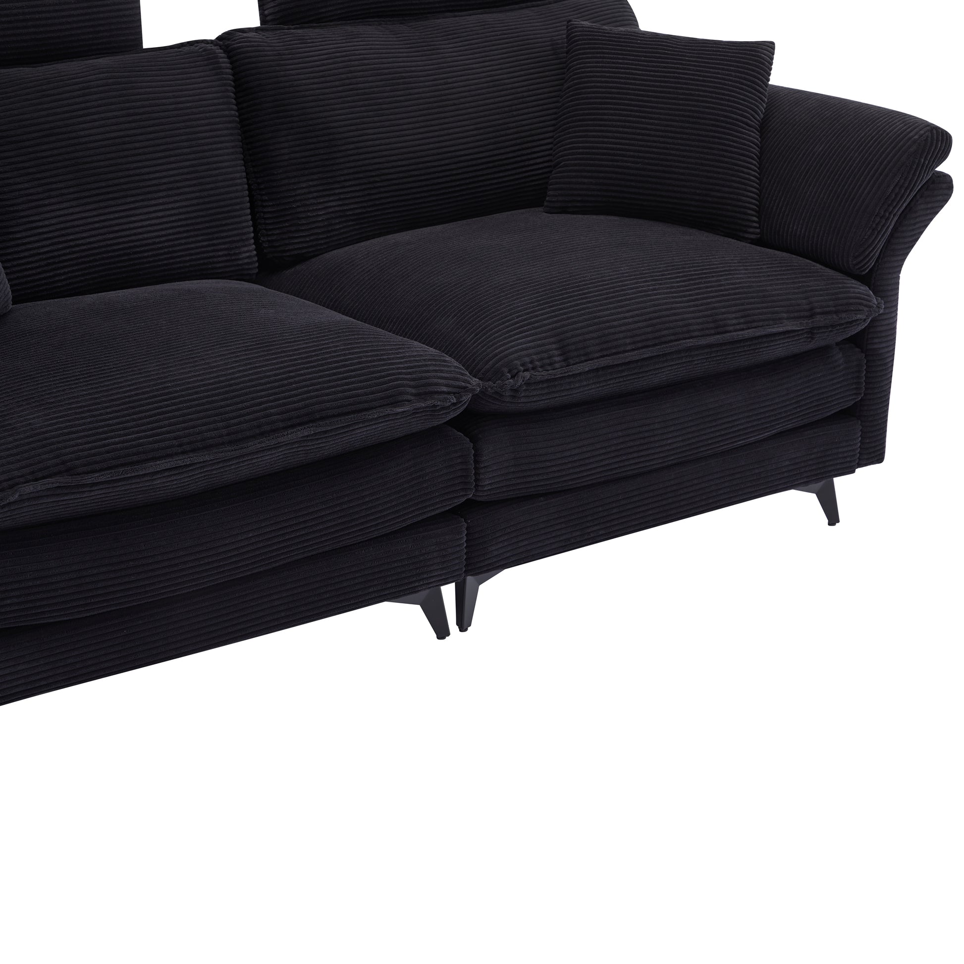 Luxurious black corduroy sectional sofa with plush cushions and modern black legs