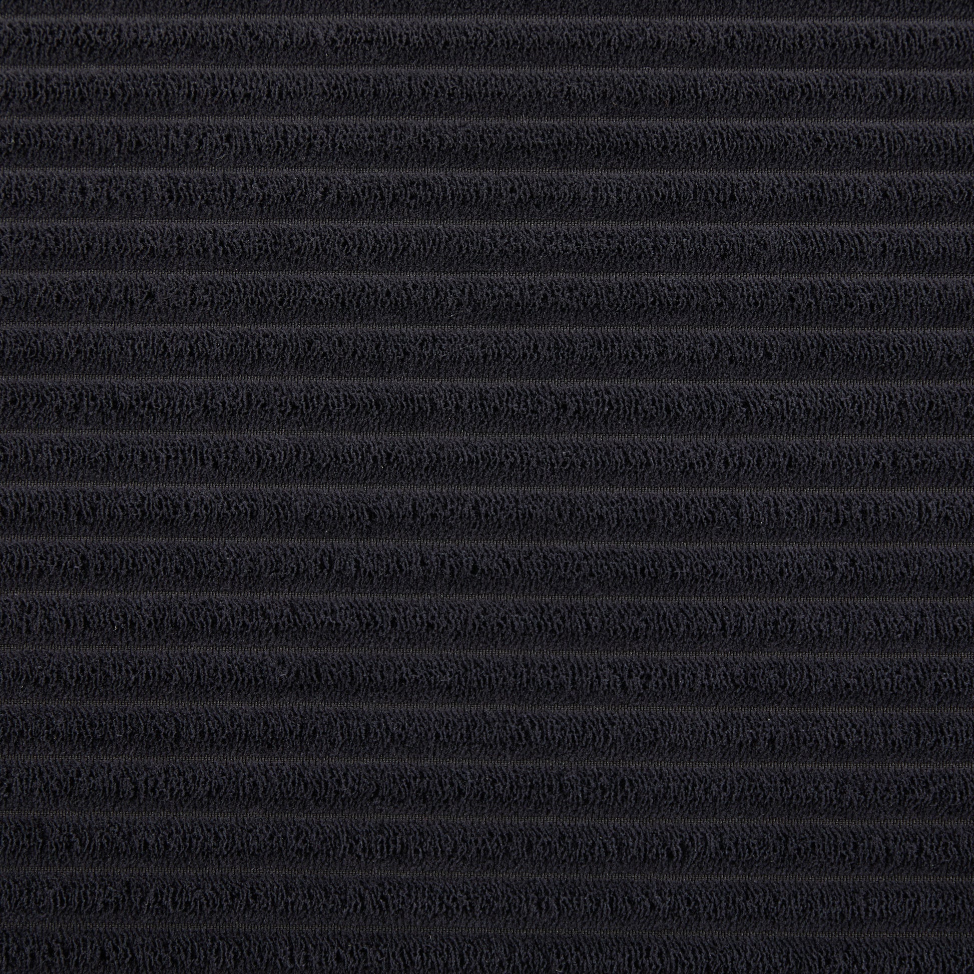 Closeup of textured black fabric with horizontal ribbed lines ideal for upholstery