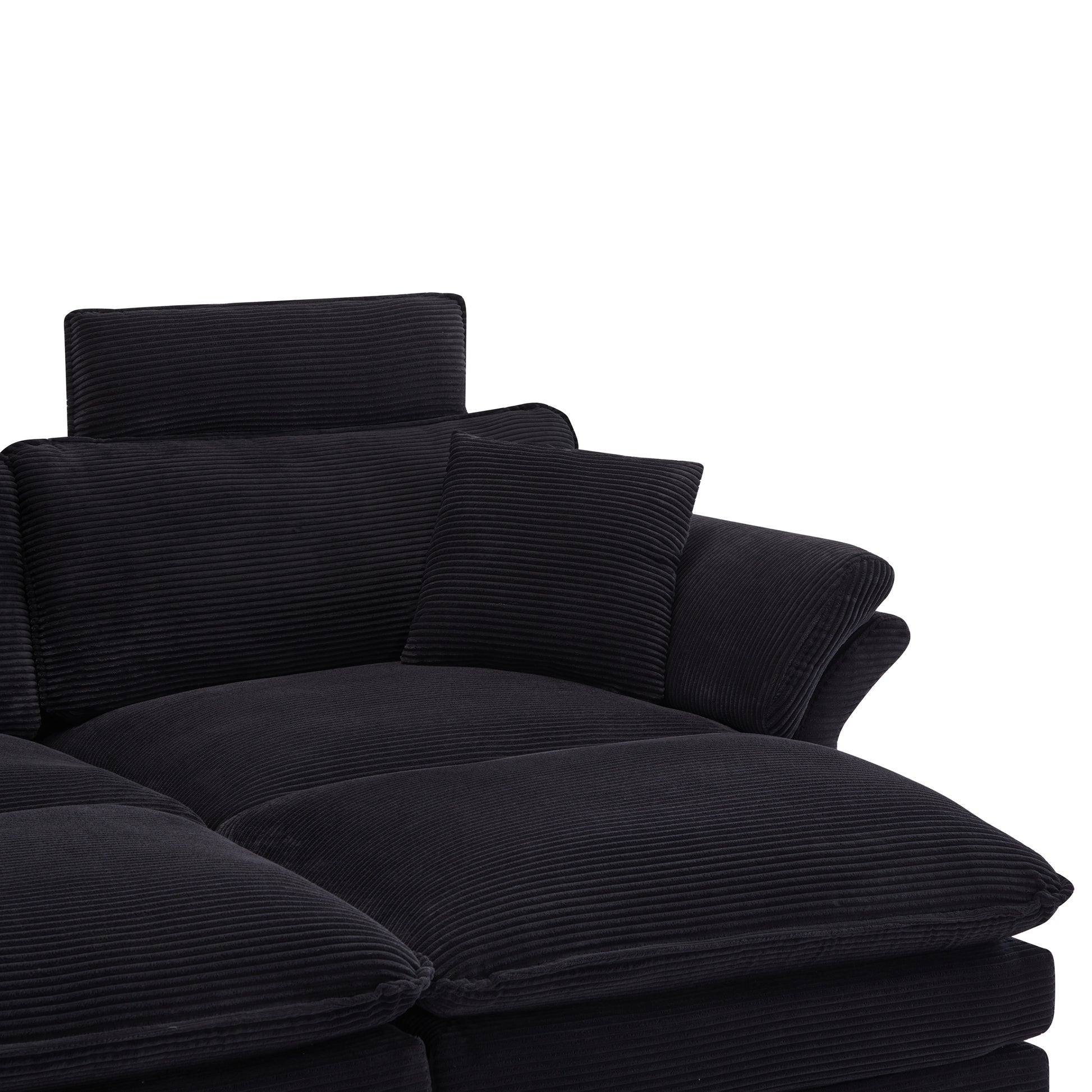 Deep black corduroy sectional sofa with adjustable headrests and plush cushions