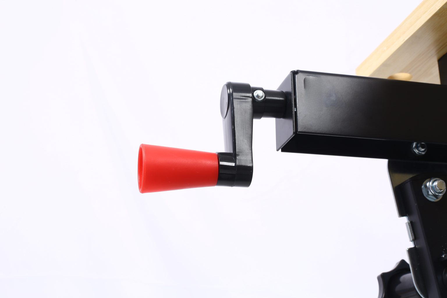 Black metal crank handle with red plastic grip for manual operation