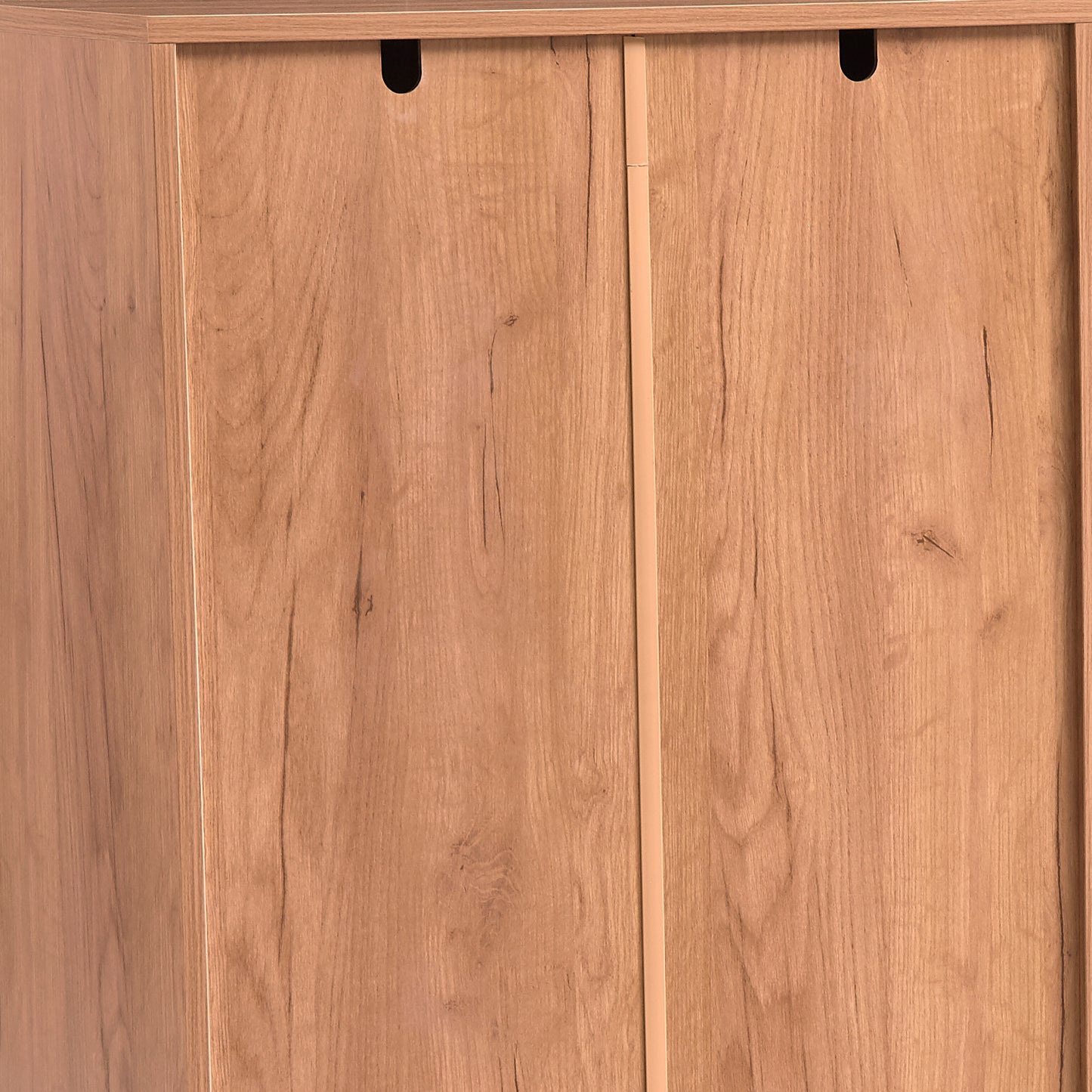 Close up of light oak wood grain on modern cabinet doors with recessed handles