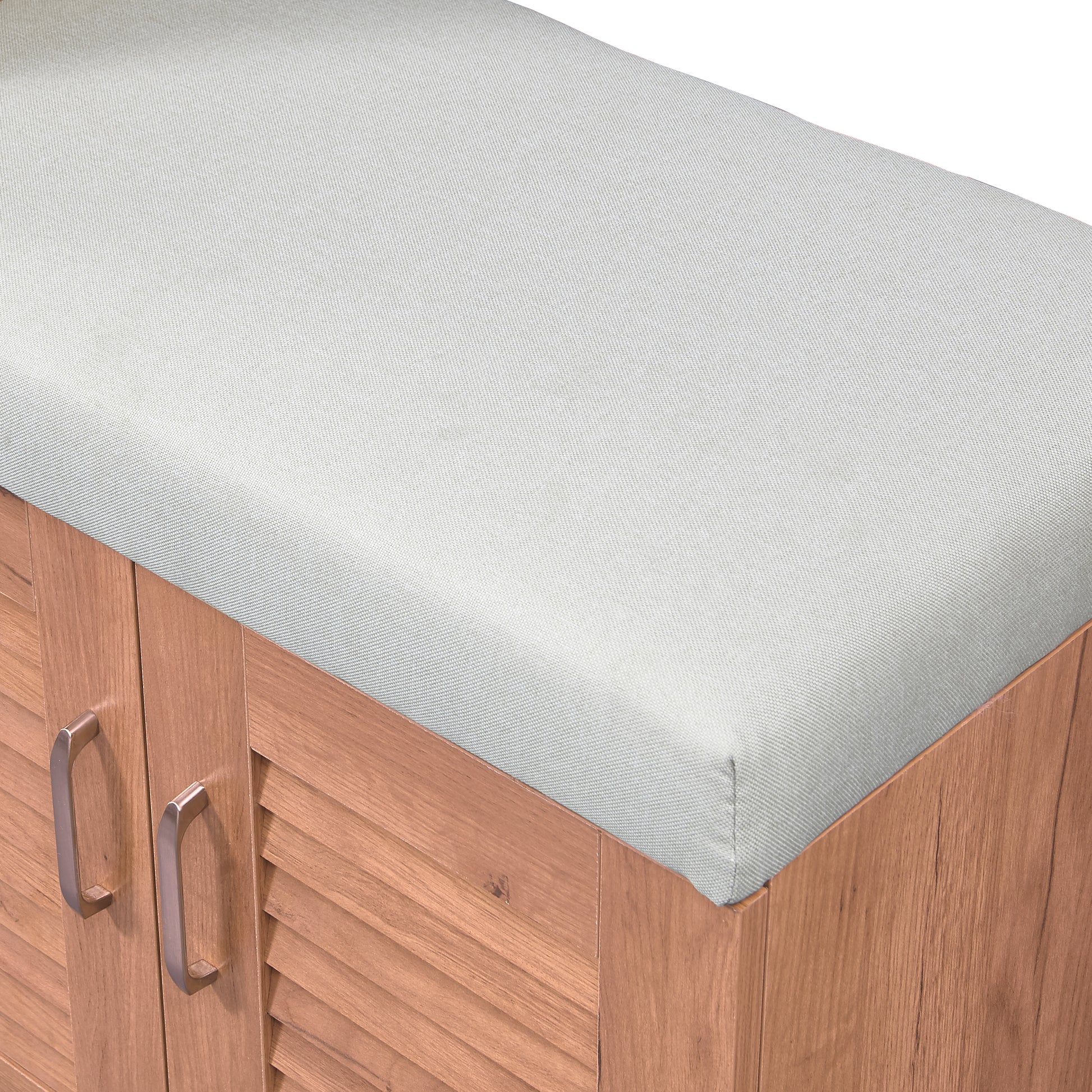 Wooden storage bench with light gray upholstered seat and brushed nickel handles