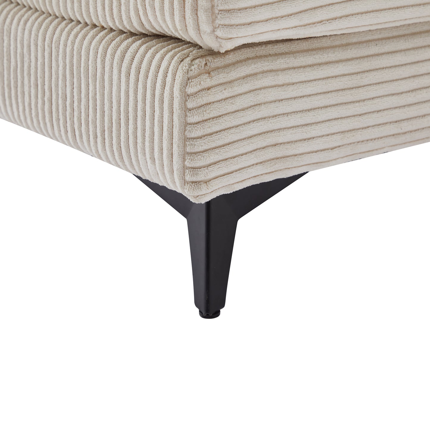 Cream corduroy couch detail with black metal legs