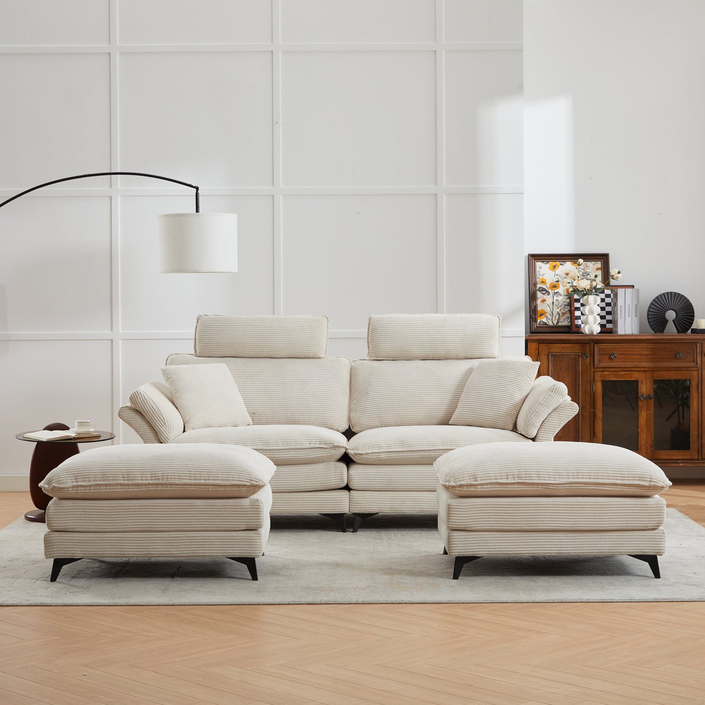 Cream corduroy sectional sofa with matching ottomans for a cozy living room