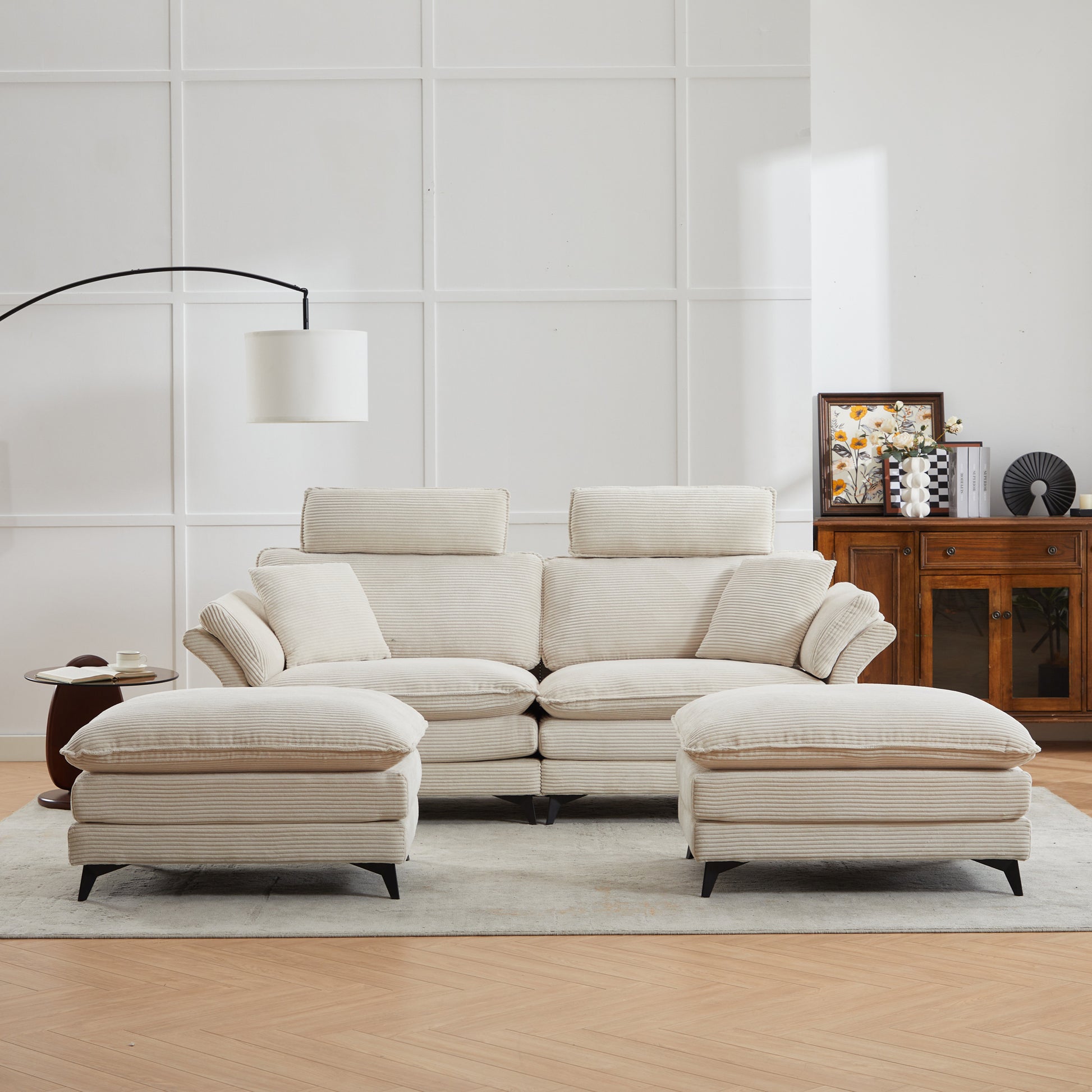 Cream corduroy sectional sofa with matching ottomans for a cozy living room