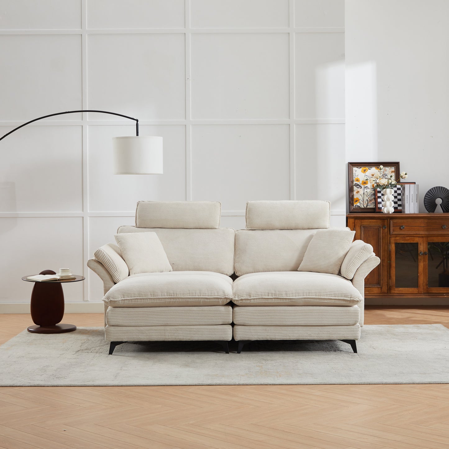 Cream corduroy sofa with deep cushions and adjustable headrests perfect for a modern living room