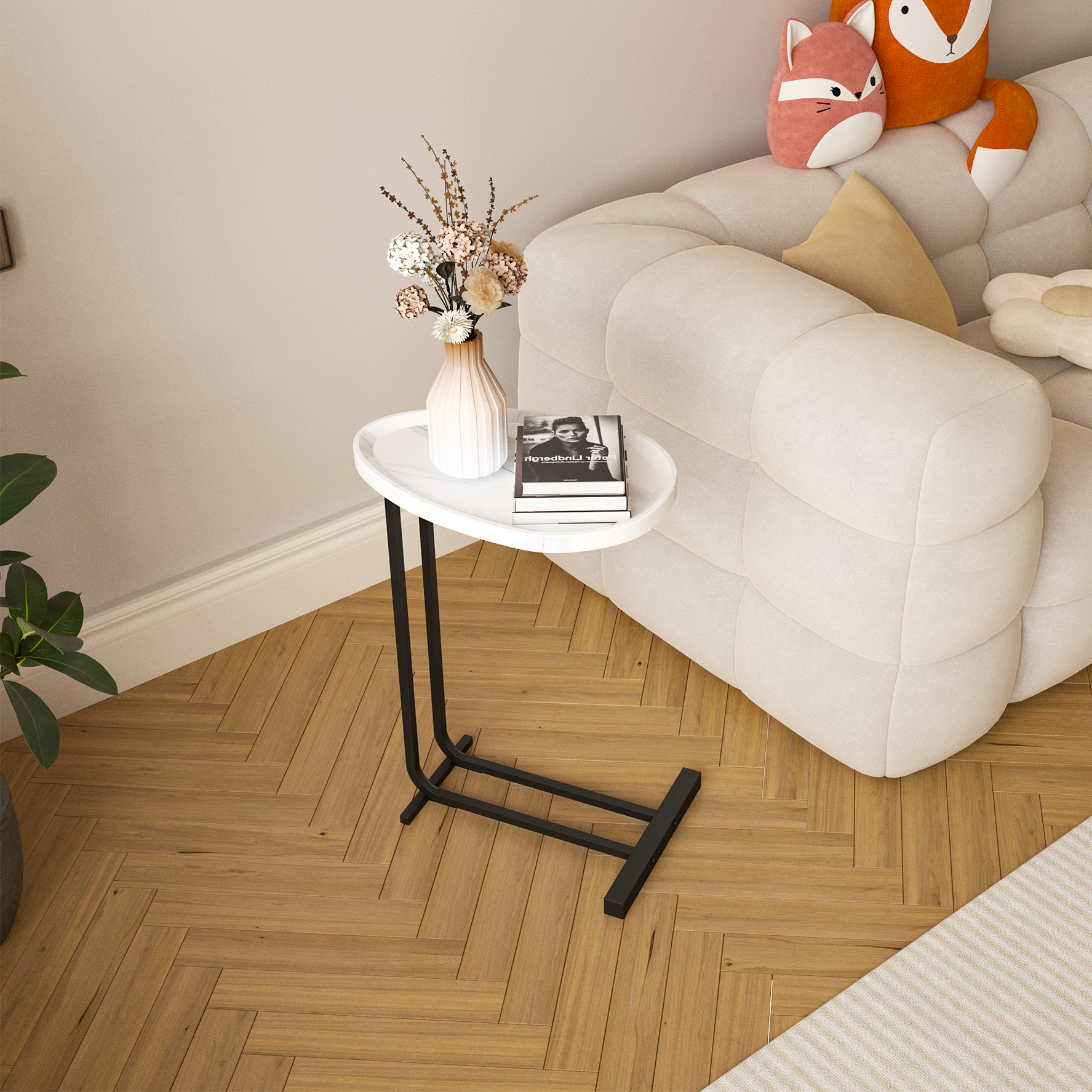 White Cshaped side table with faux marble top and black metal legs