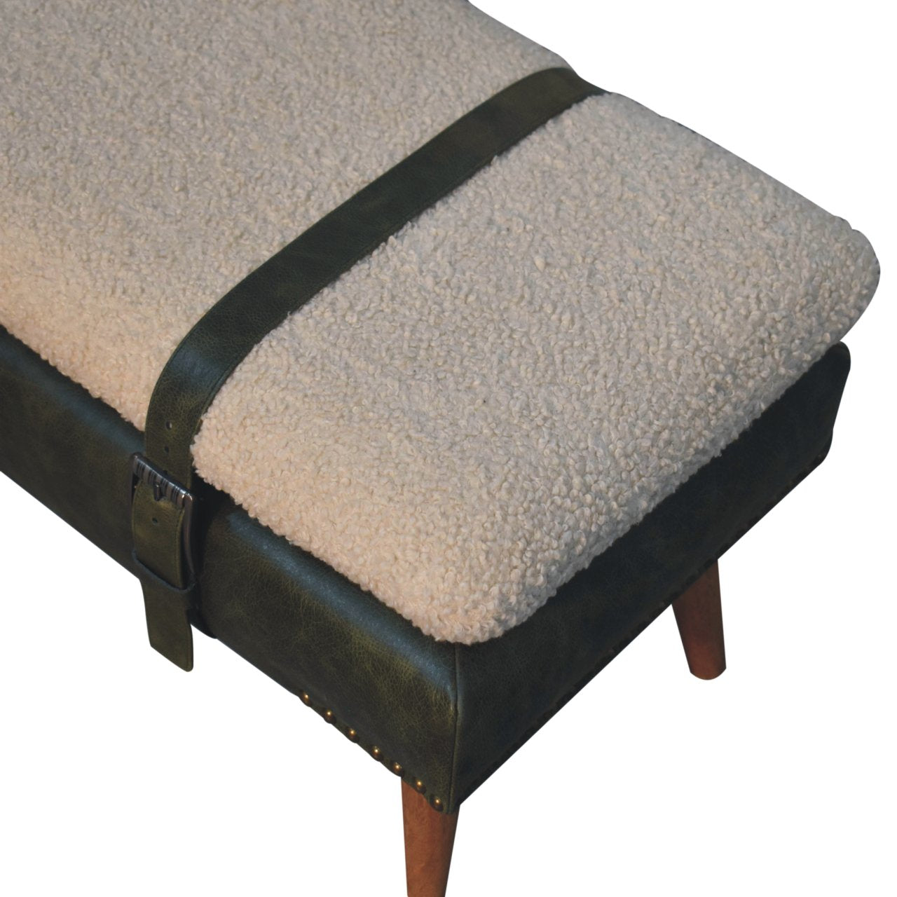 Cream boucle bench with dark green leather straps and frame