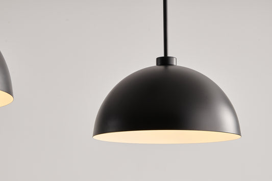 Matte black dome pendant light with warm interior modern minimalist design