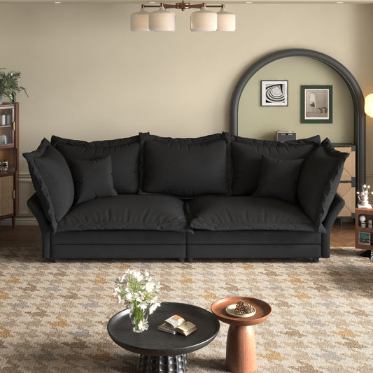 Plush black sectional sofa with deep cushions perfect for a modern living room