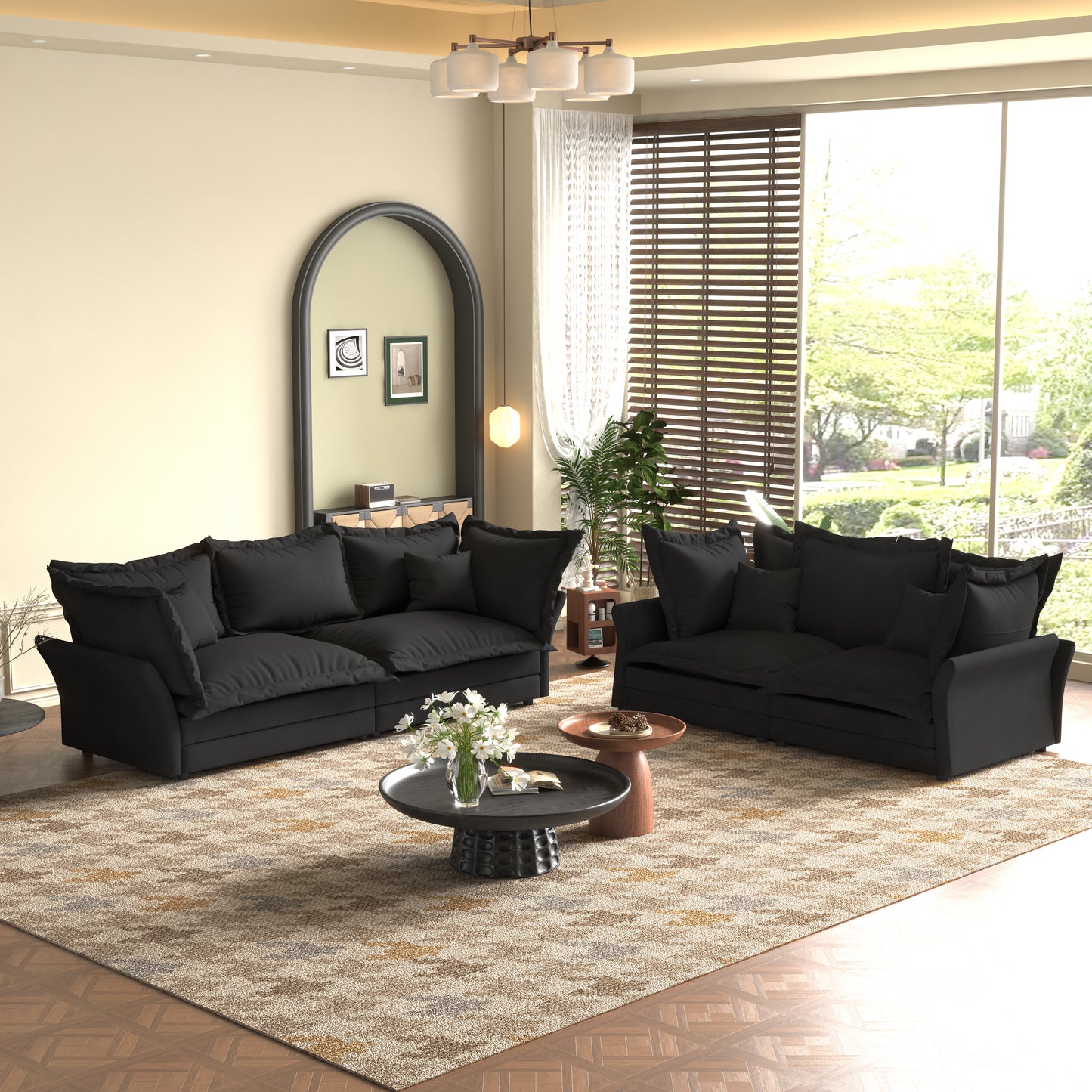 Plush black sectional sofa with deep seats and comfortable cushions in a modern living room