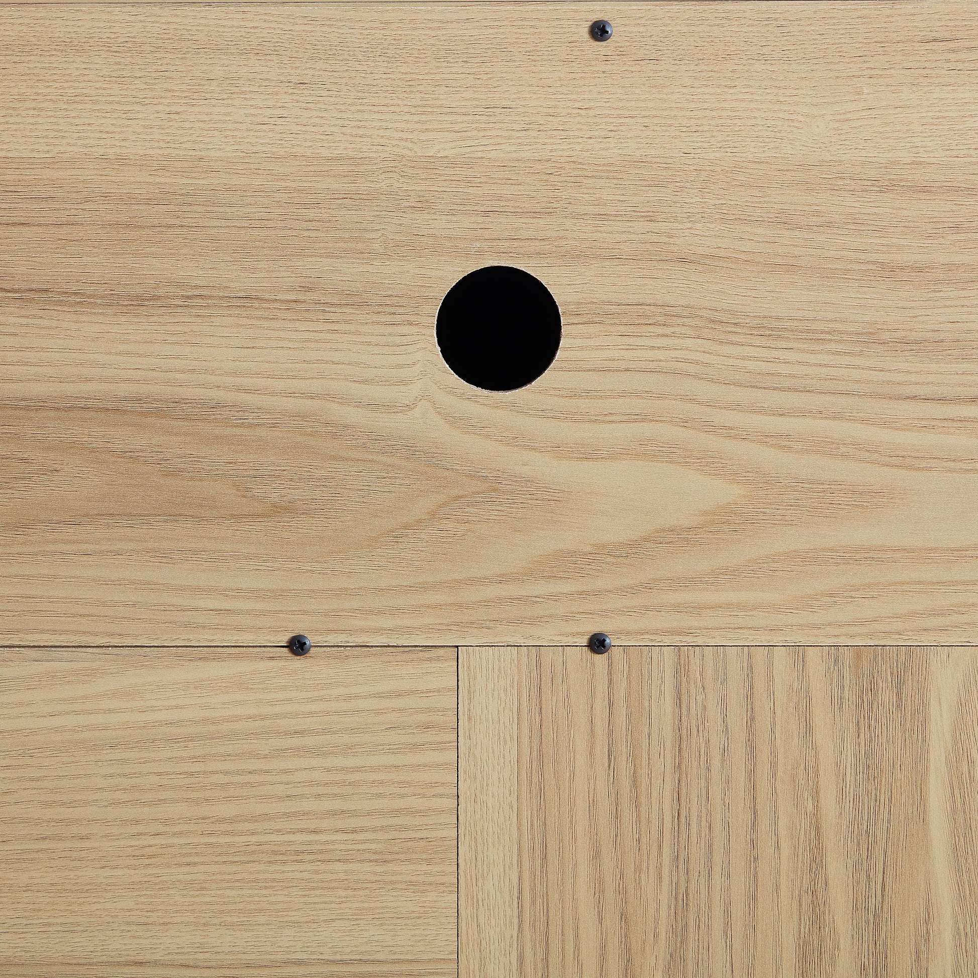Light oak wood panel with cable management hole and screw details
