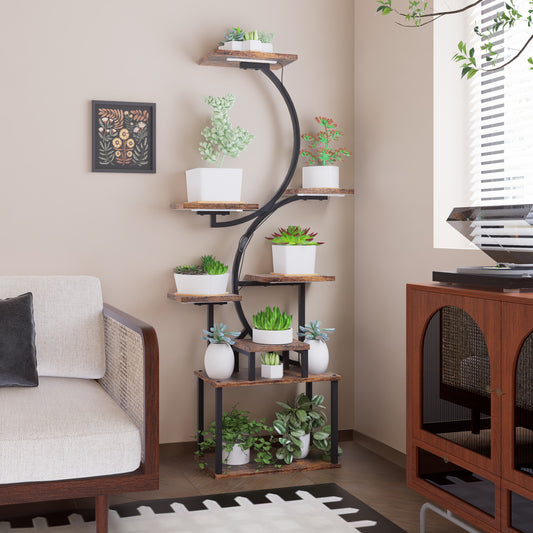 Tiered metal plant stand with rustic wood shelves displaying various succulents and potted plants in white pots