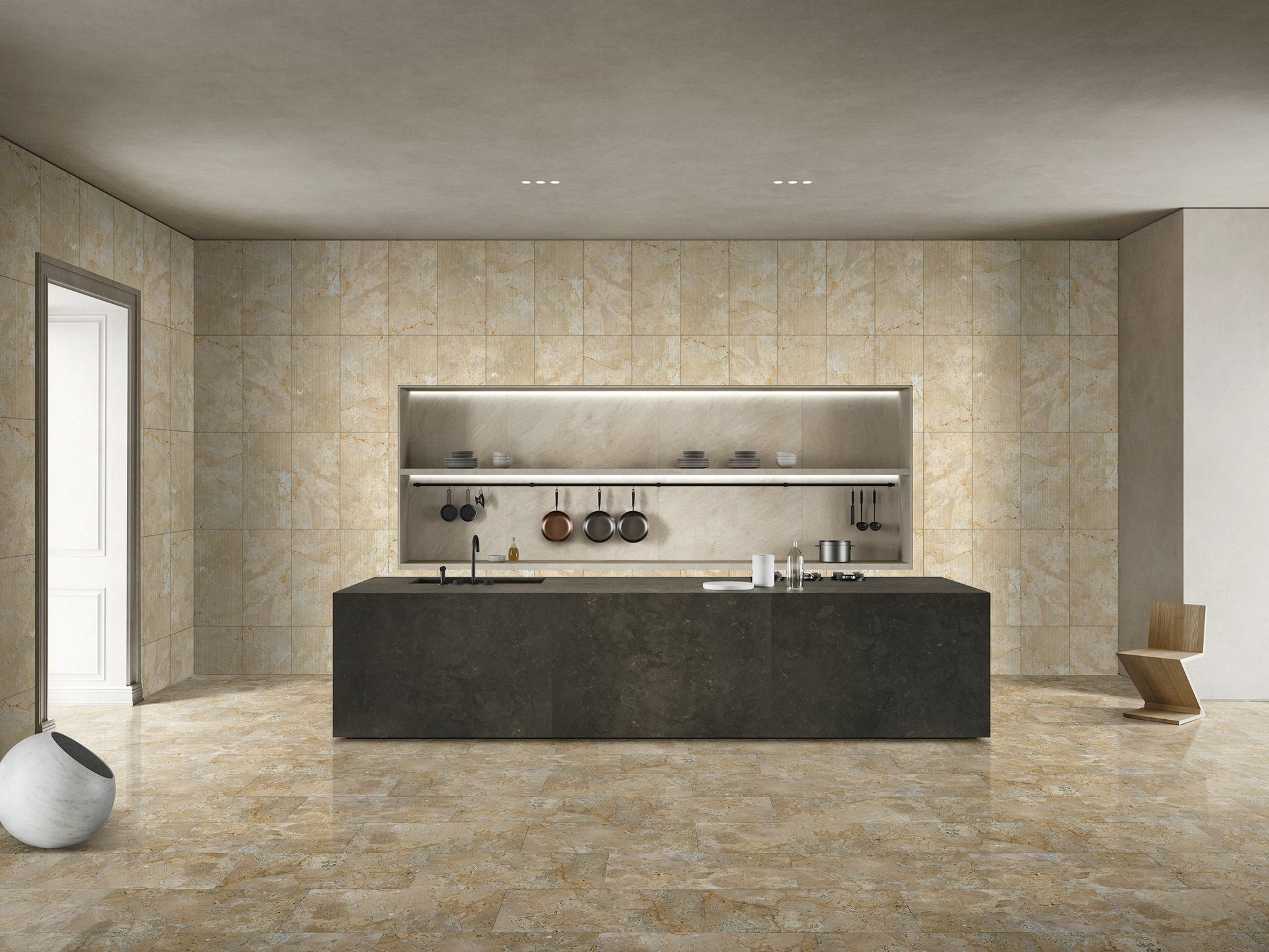 Modern dark stone kitchen island with integrated sink and stovetop