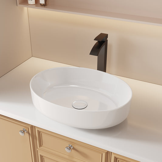 Oval ceramic vessel sink with matte black waterfall faucet