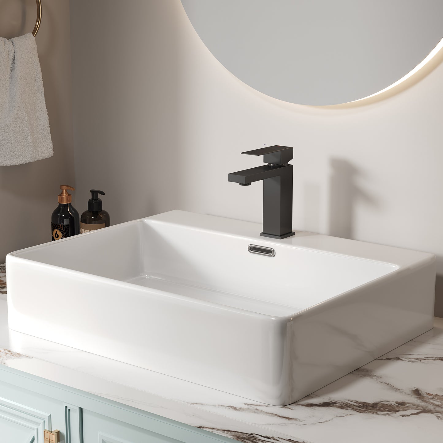 Modern black matte bathroom faucet installed on a rectangular white ceramic basin