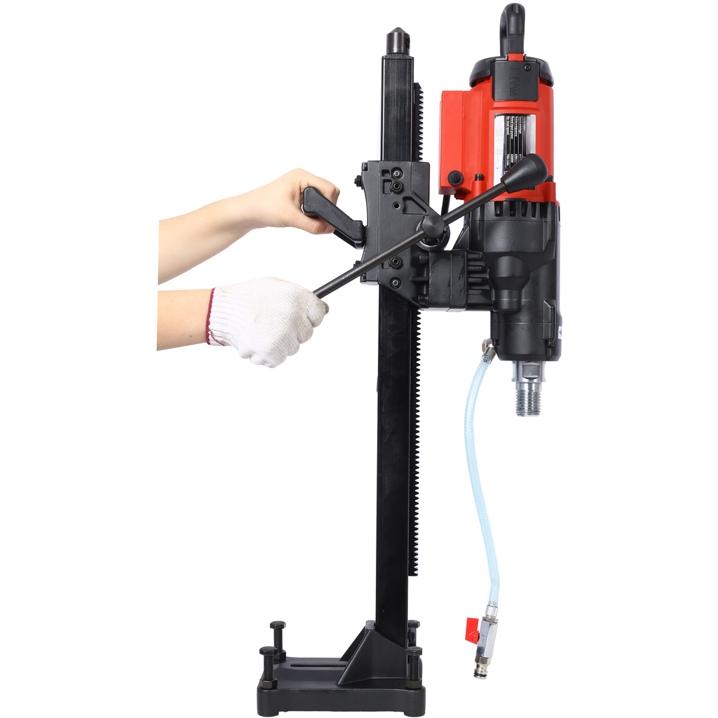 Red and black core drill with adjustable stand and water hose attachment