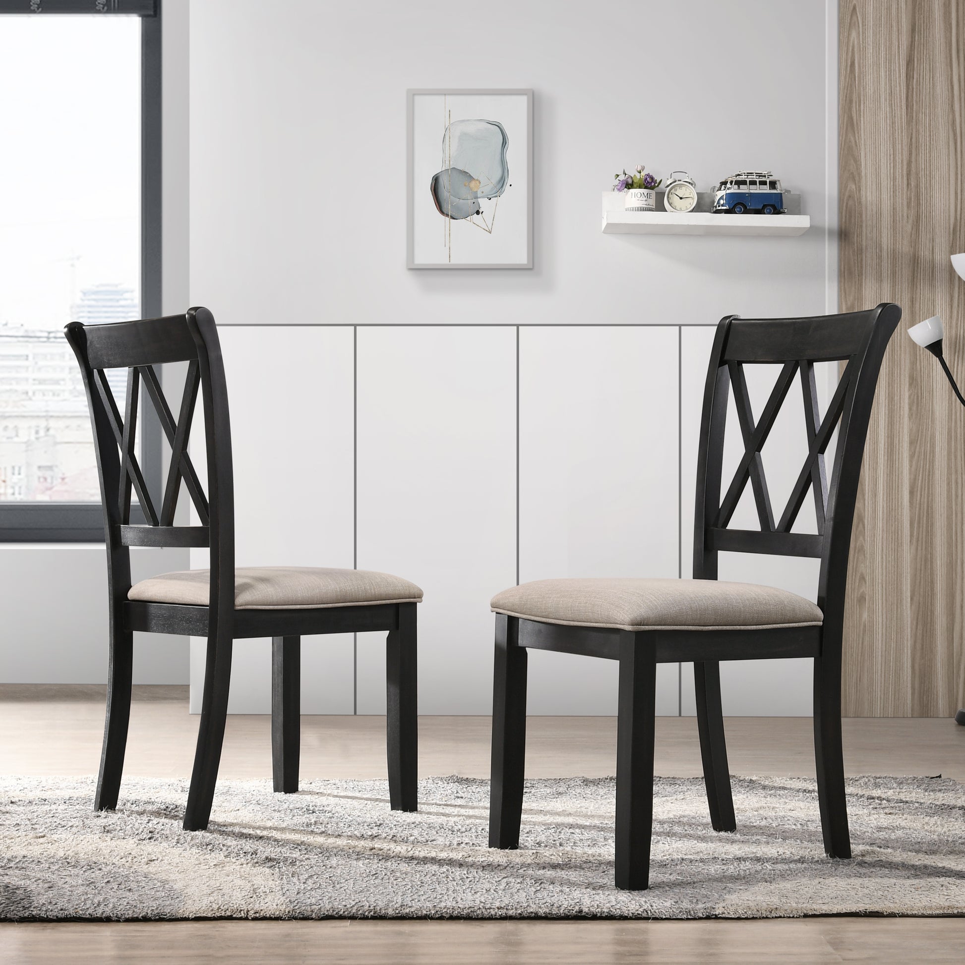 Black wooden dining chairs with Xback design and beige upholstered seats