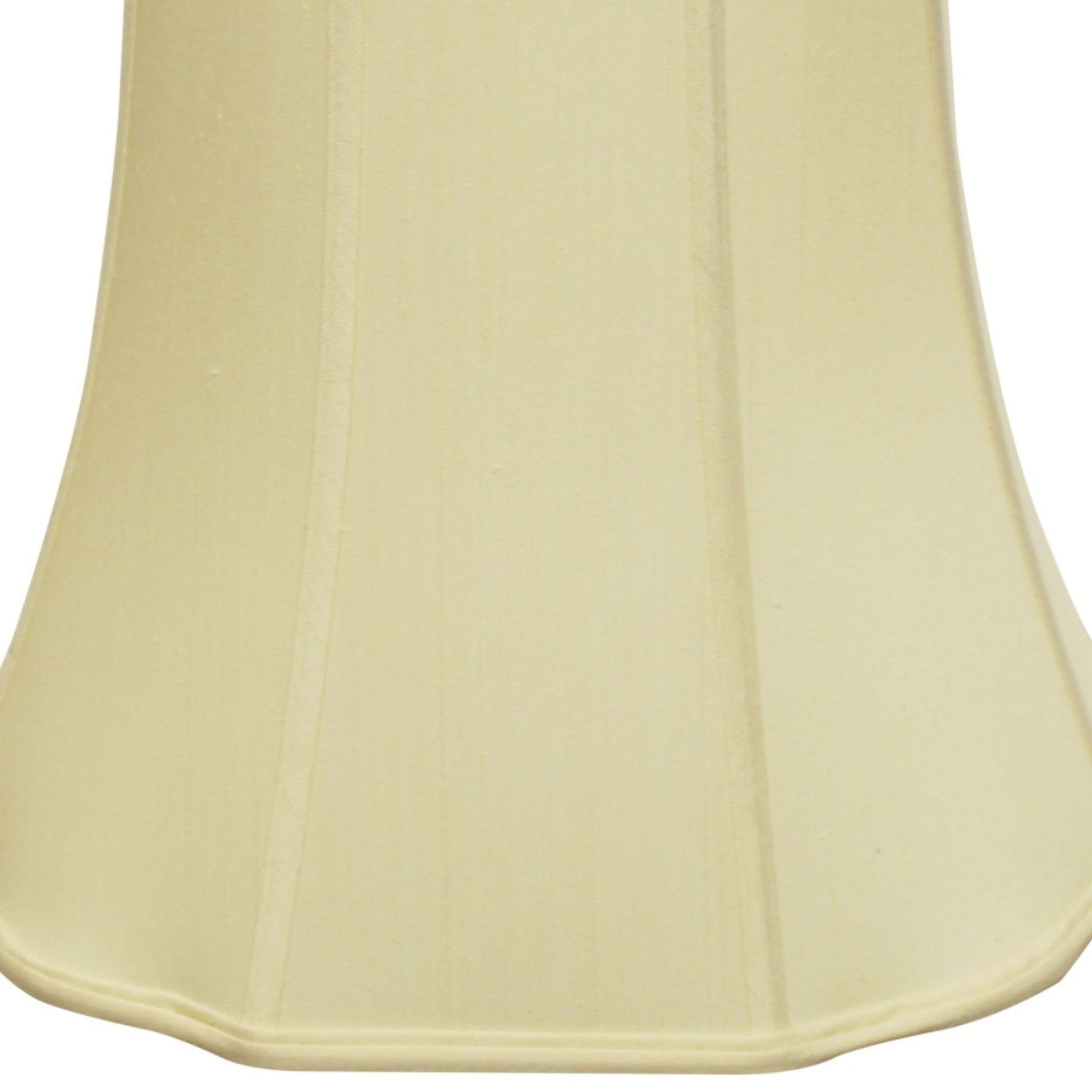 Cream bell lamp shade made from a soft fabric with vertical stitching detail