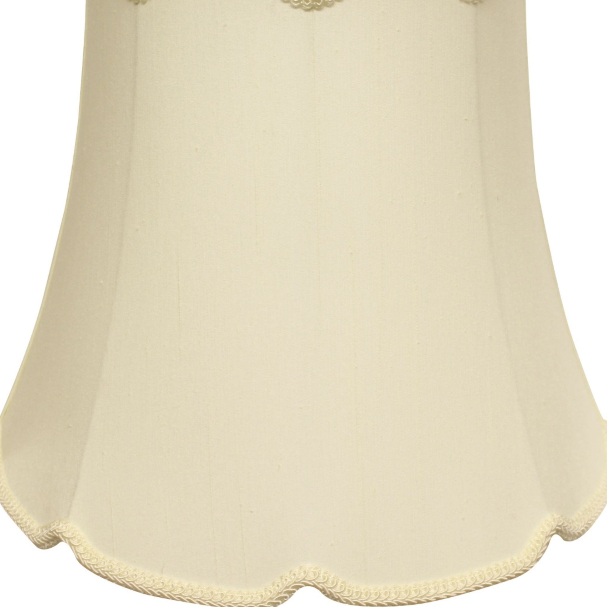 Cream bell lampshade with decorative trim fabric texture visible