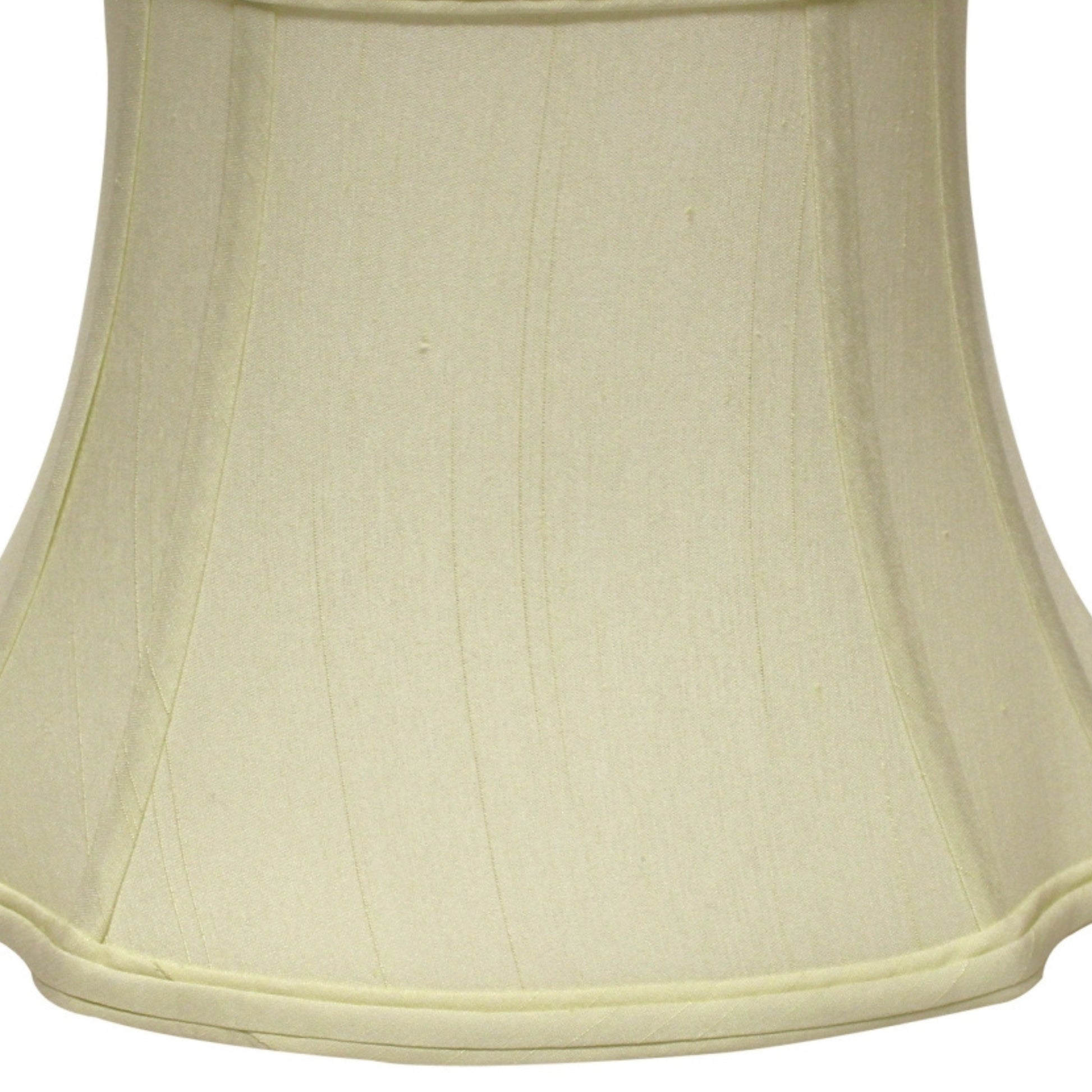 Cream bell lamp shade with pleated fabric and a flared bottom edge