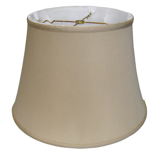 Beige bell lamp shade with white interior and brass harp support