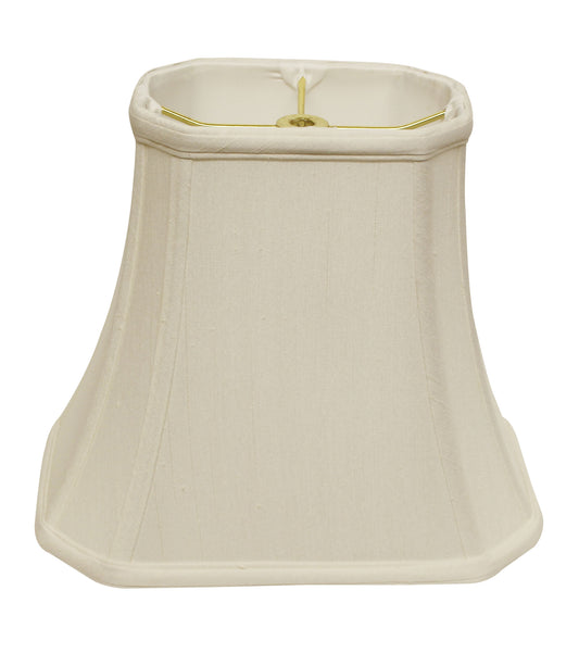 Cream bell shape lampshade with a pleated linen texture and brass hardware