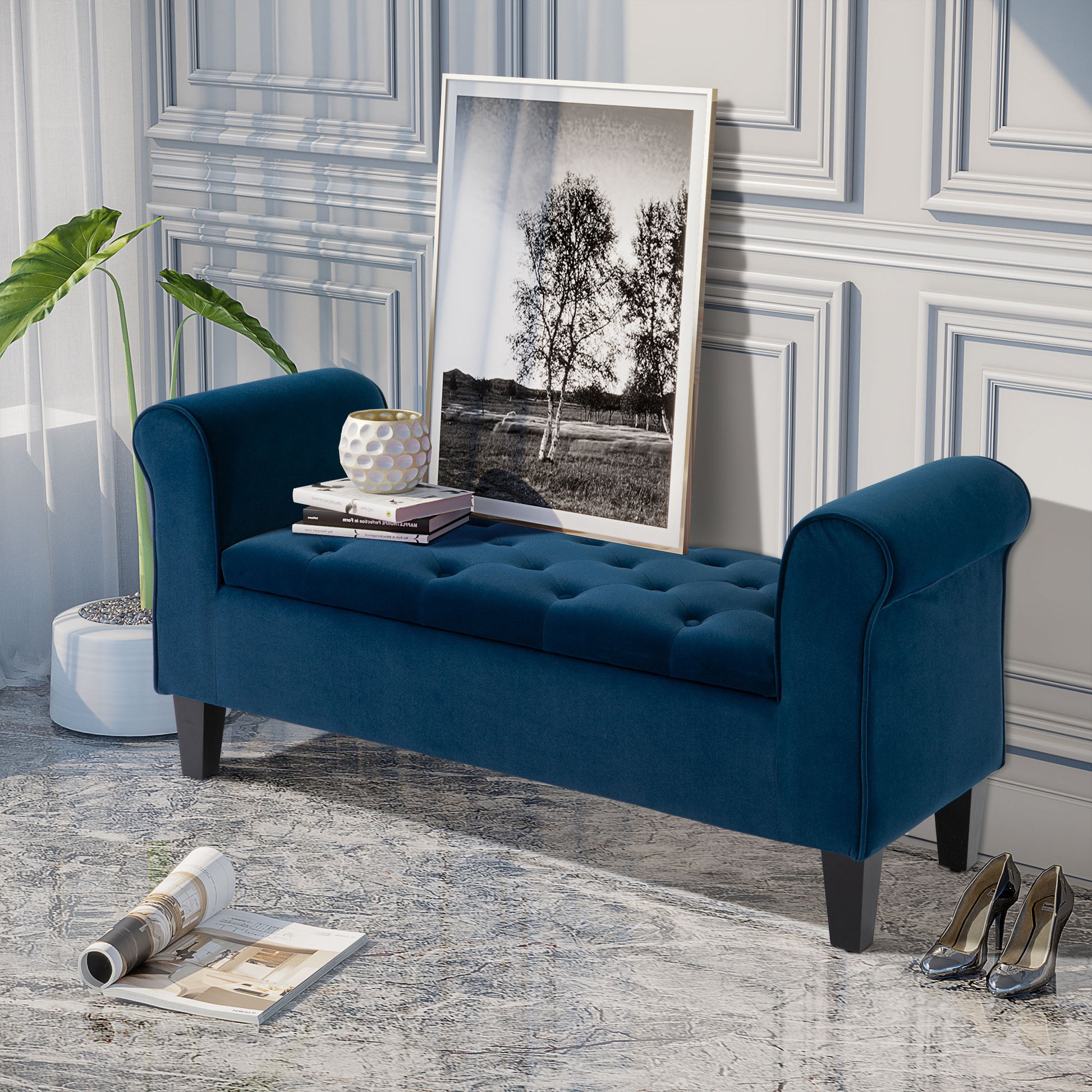Tufted navy velvet bench with rolled arms and dark wooden legs