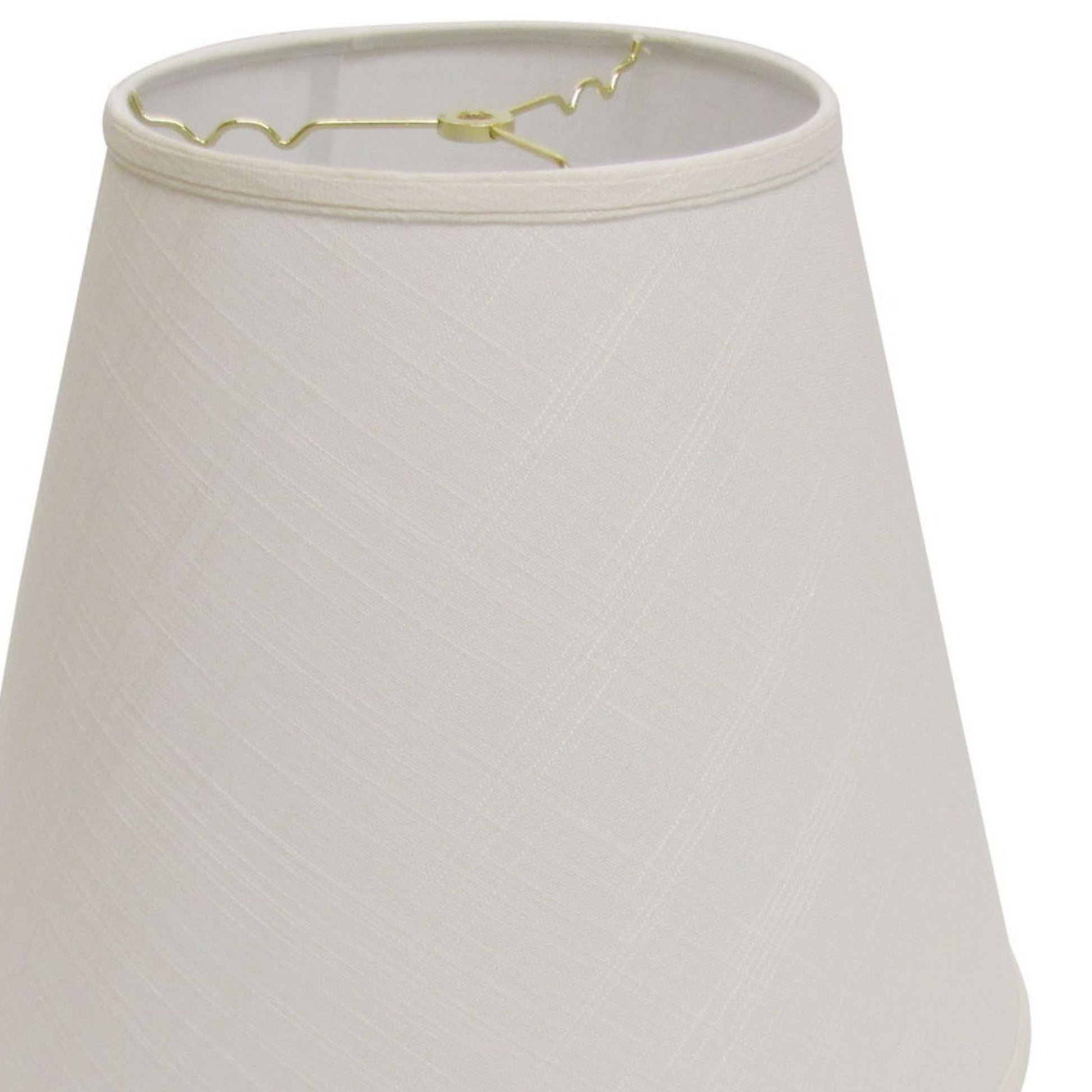 Cream fabric bell lamp shade with subtle texture and brass hardware