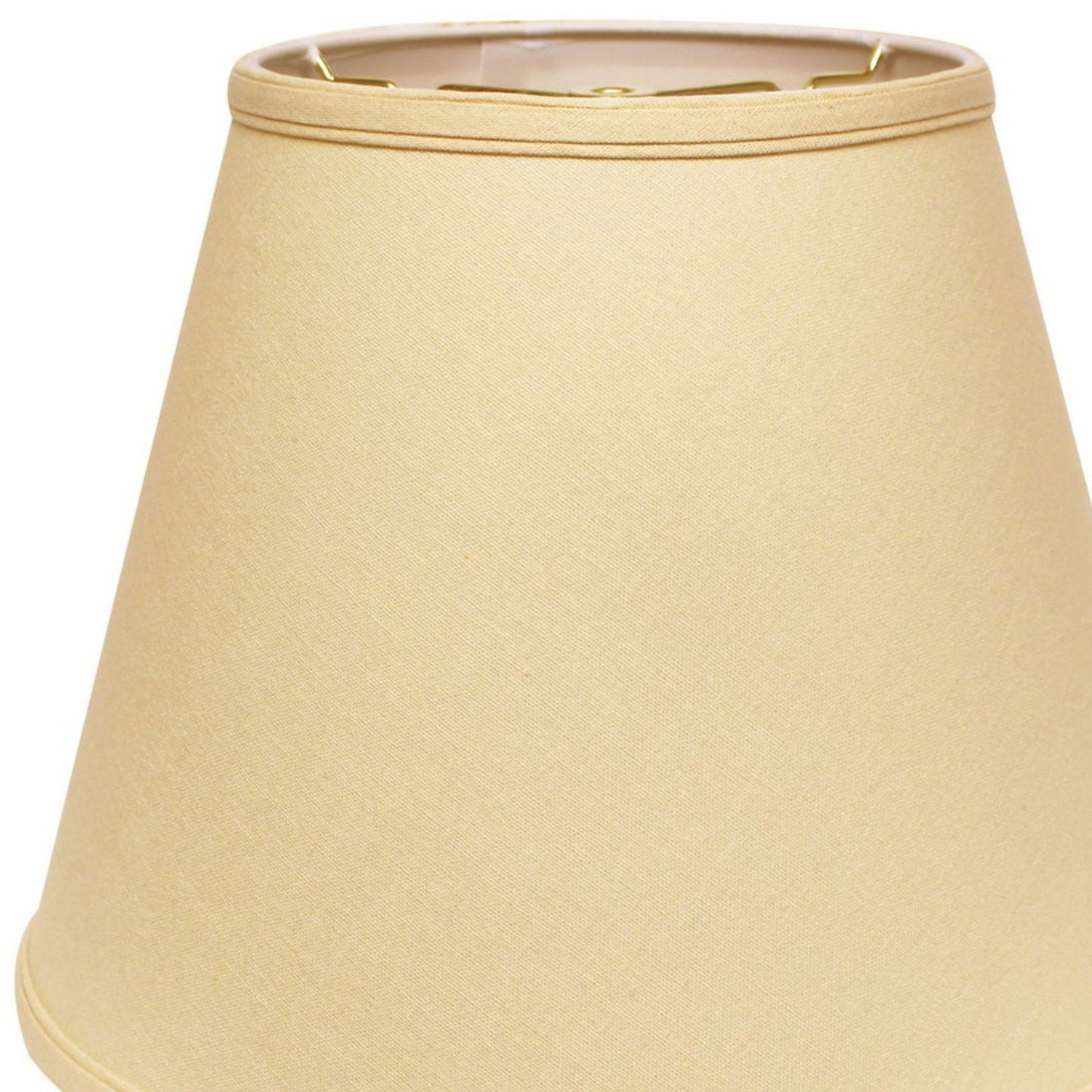 Cream empire lampshade with subtle fabric texture and brass hardware