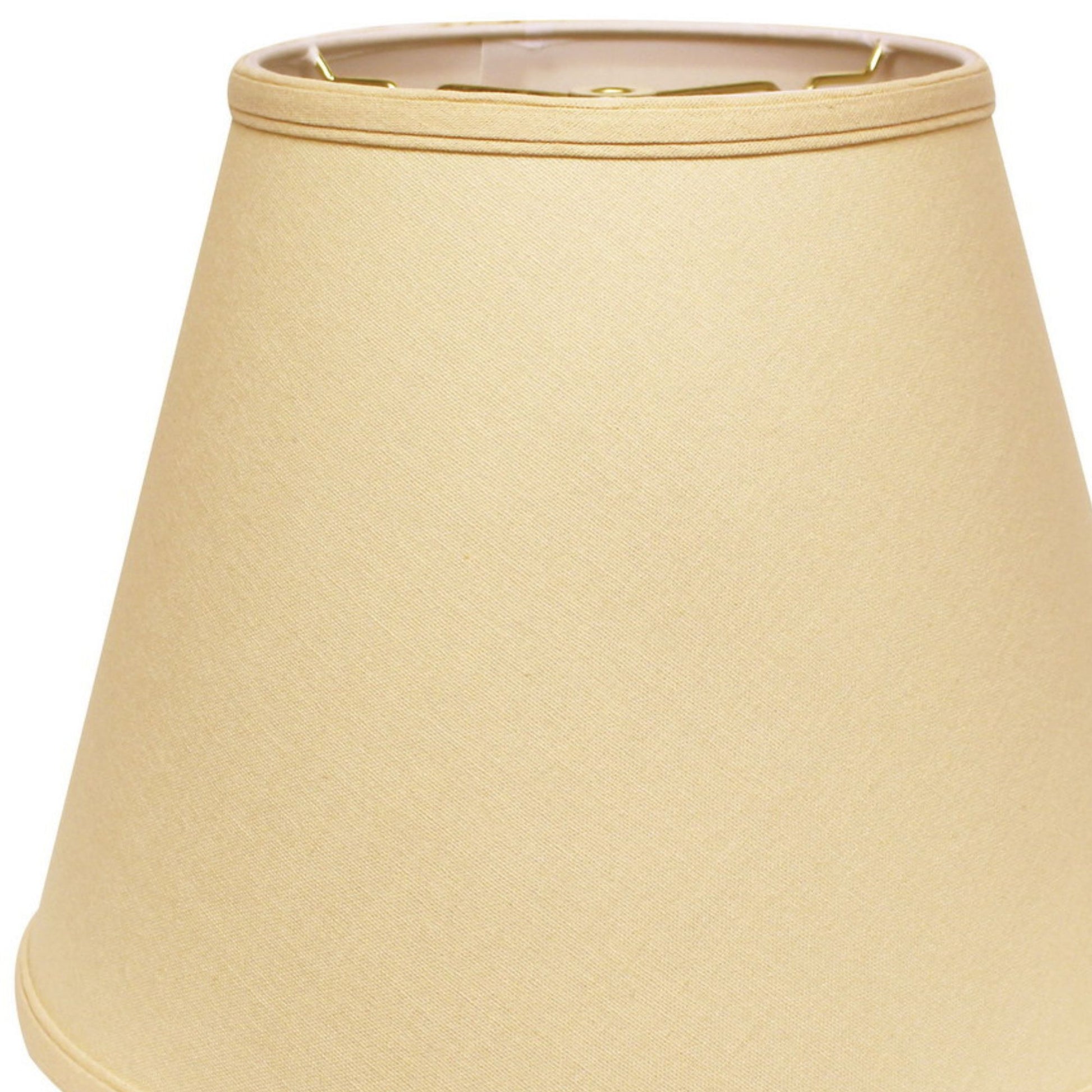 Cream empire lampshade with subtle fabric texture and brass hardware